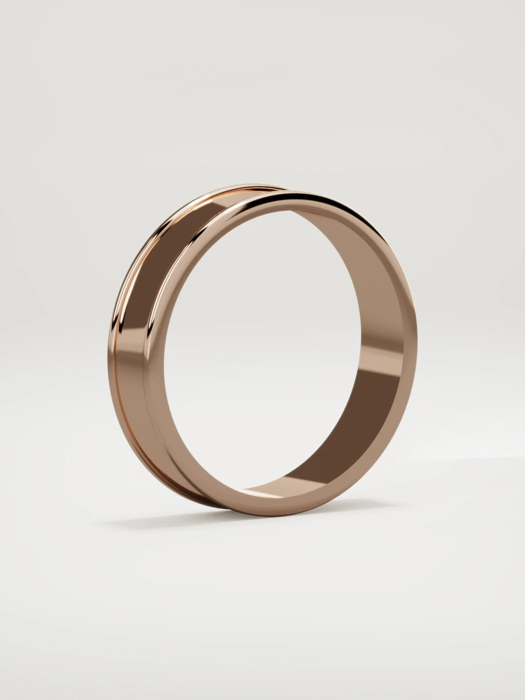 The Valle channel men's wedding band in 14K rose gold, 5 mm, standing three-quarter view