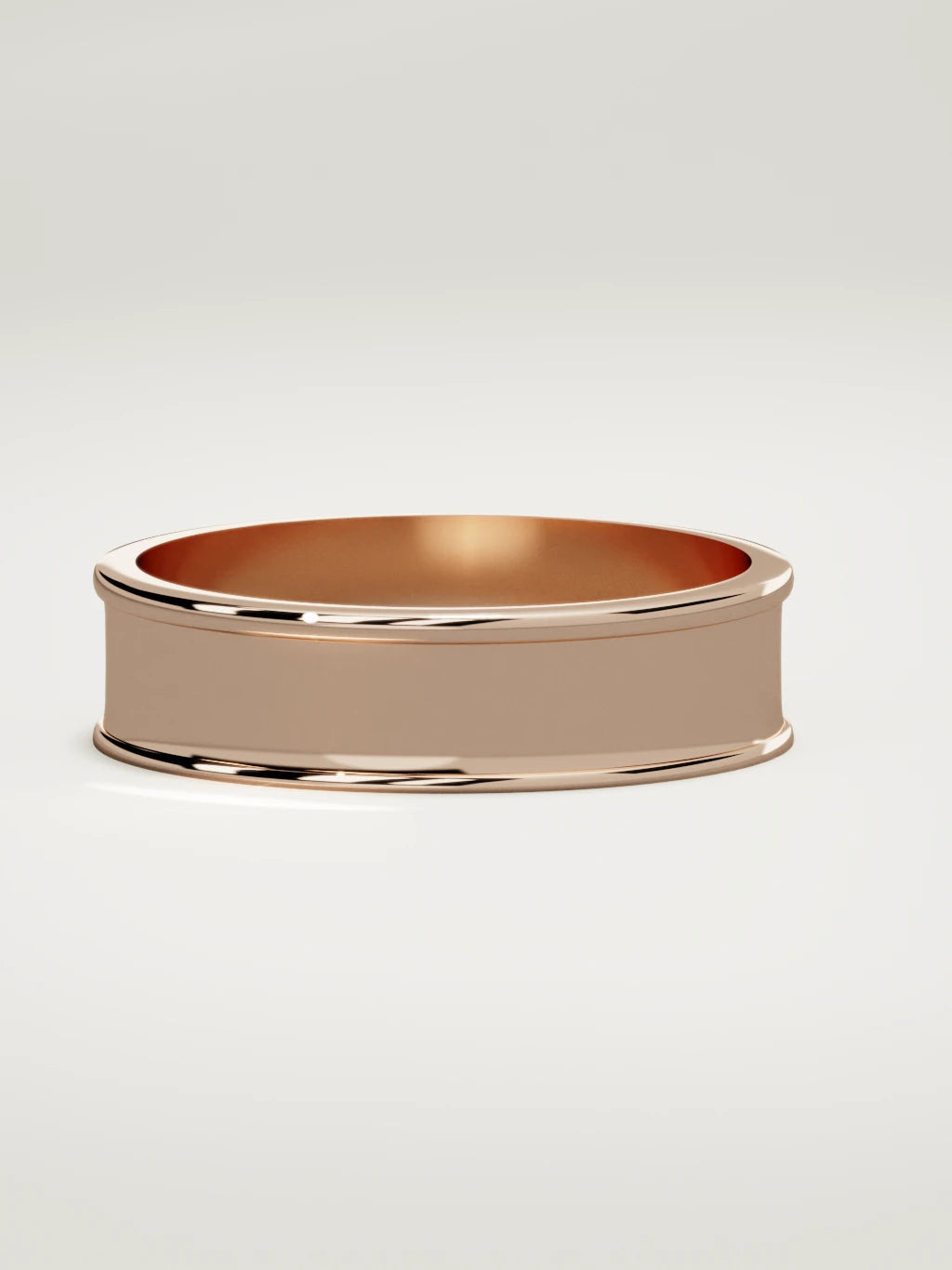 The Valle channel men's wedding band in 14K rose gold, 6 mm, three-quarter view