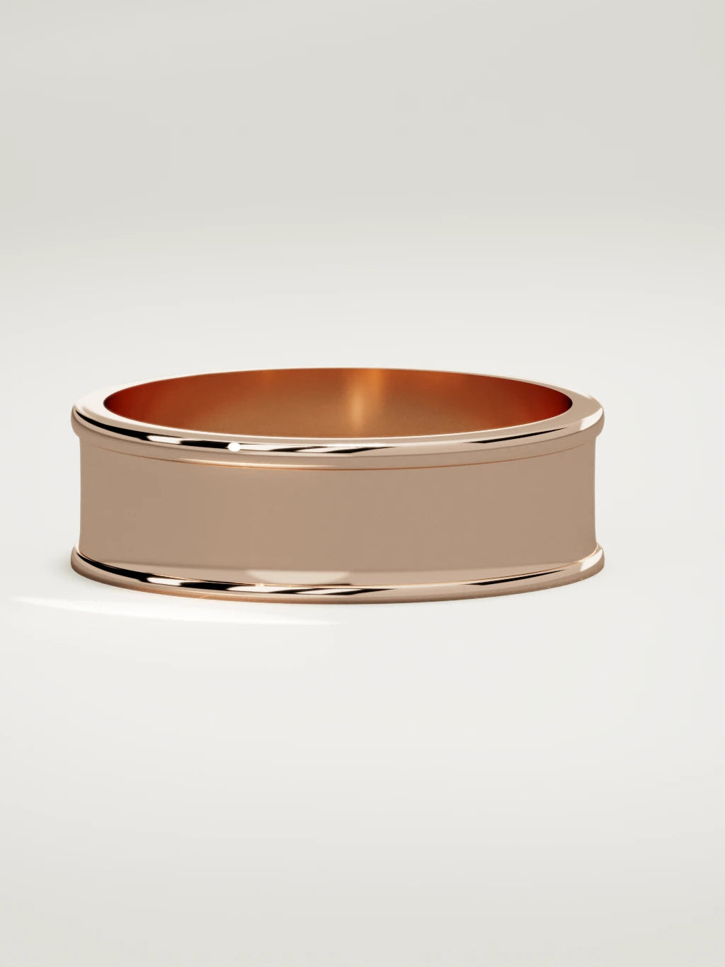 The Valle channel men's wedding band in 14K rose gold, 7 mm, three-quarter view