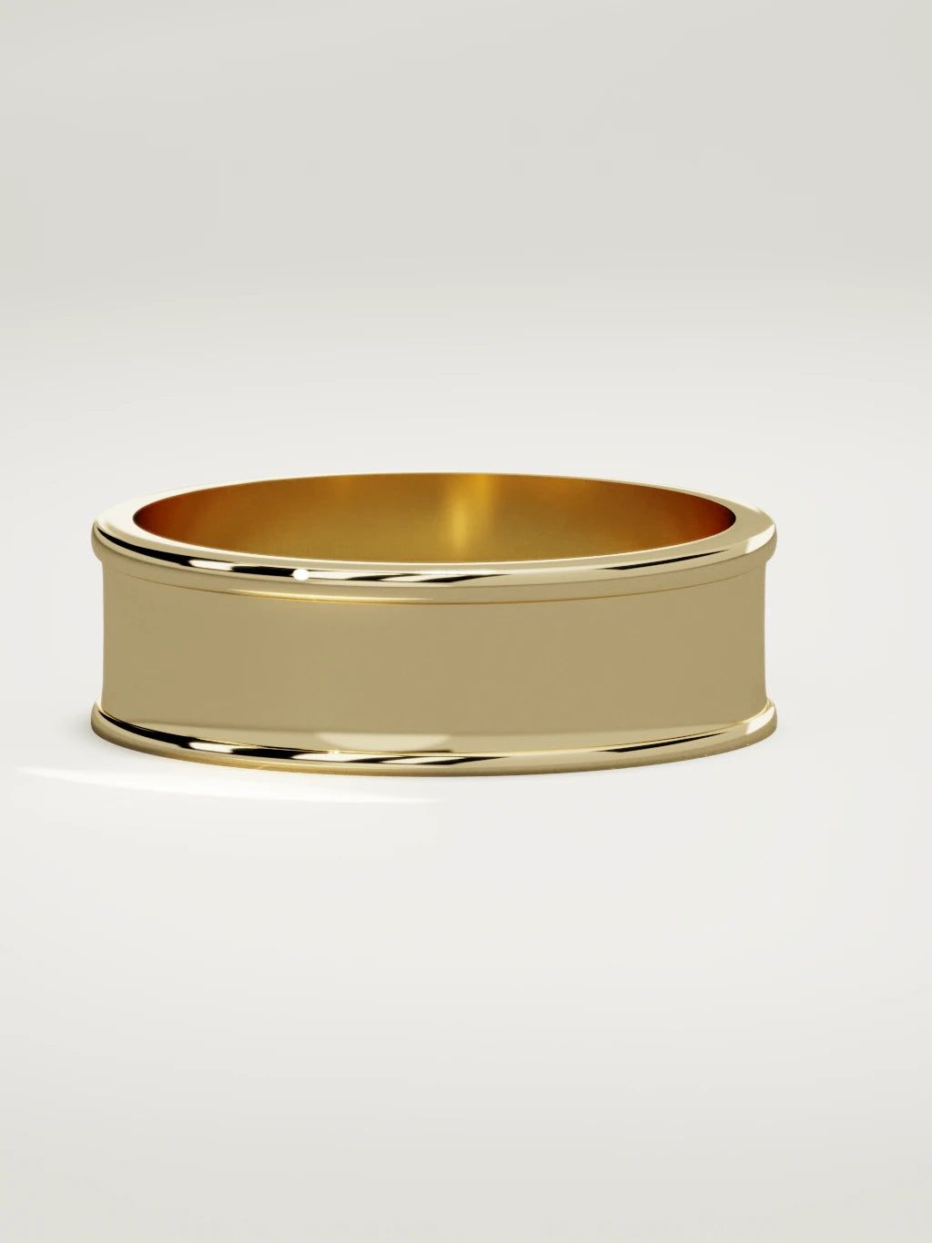 The Valle channel men's wedding band in 14K yellow gold, 7 mm, three-quarter view