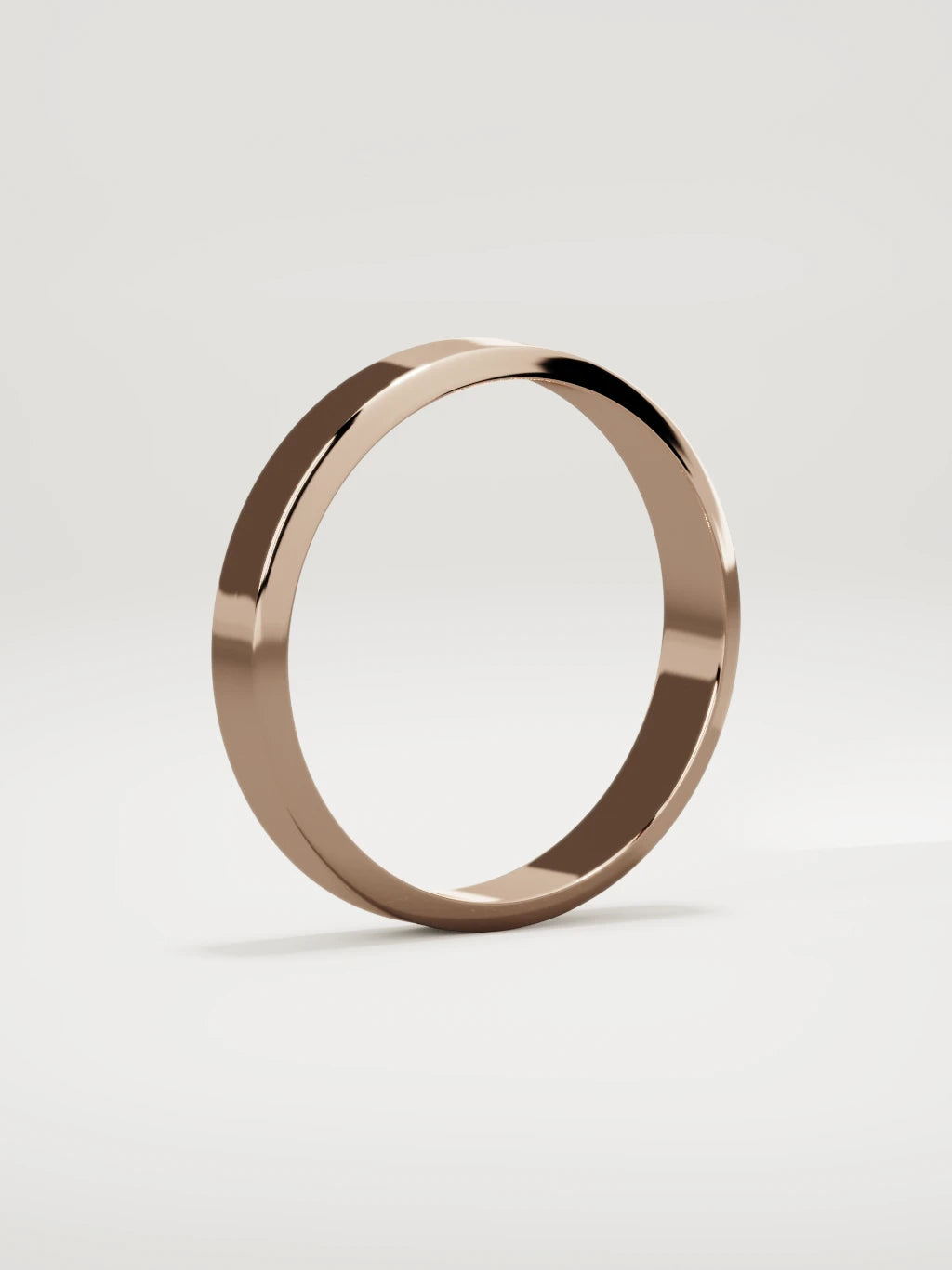 The Canto chamfered-edge men's wedding band in 14K rose gold, 4 mm, standing three-quarter view