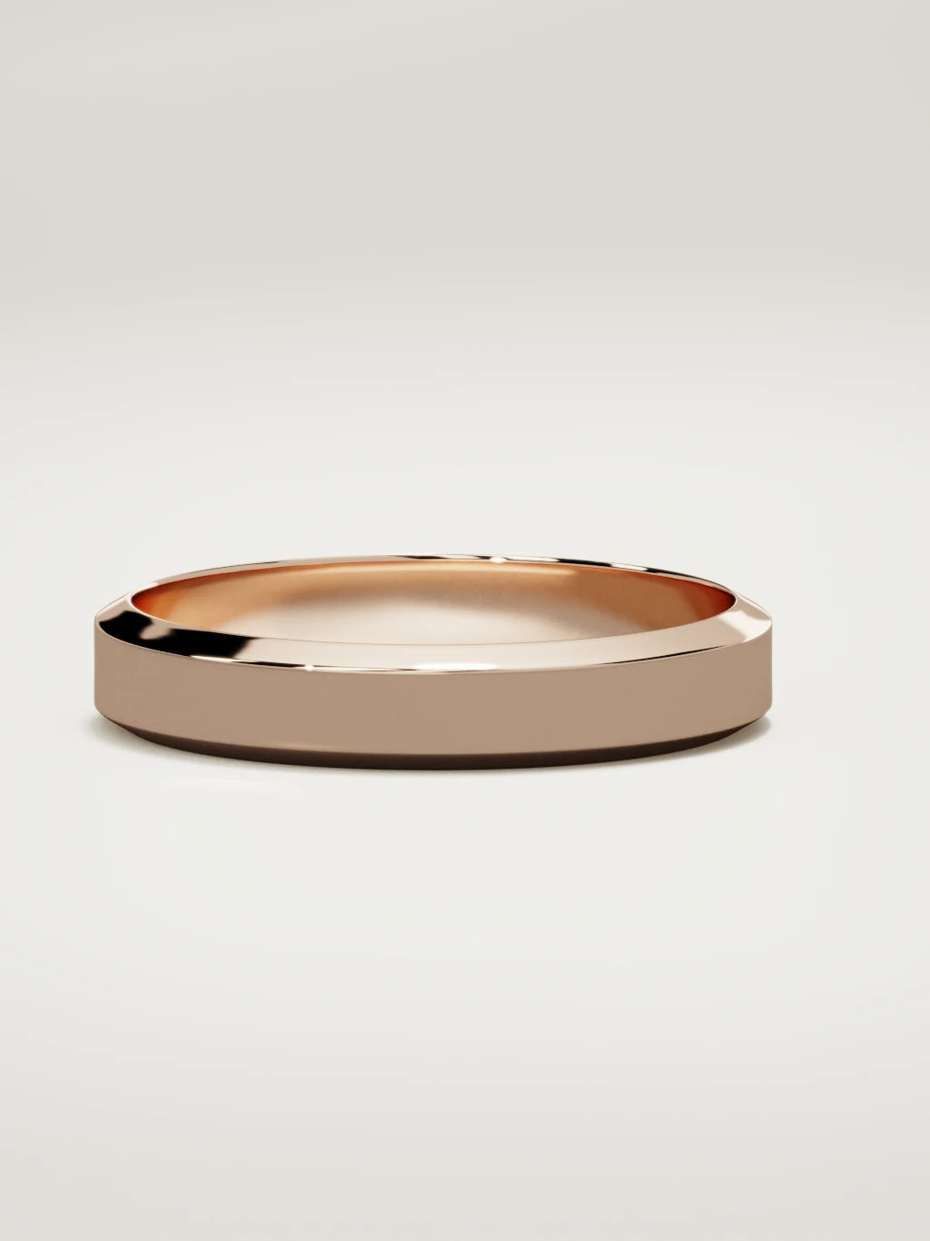 The Canto chamfered-edge men's wedding band in 14K rose gold, 4 mm, three-quarter view