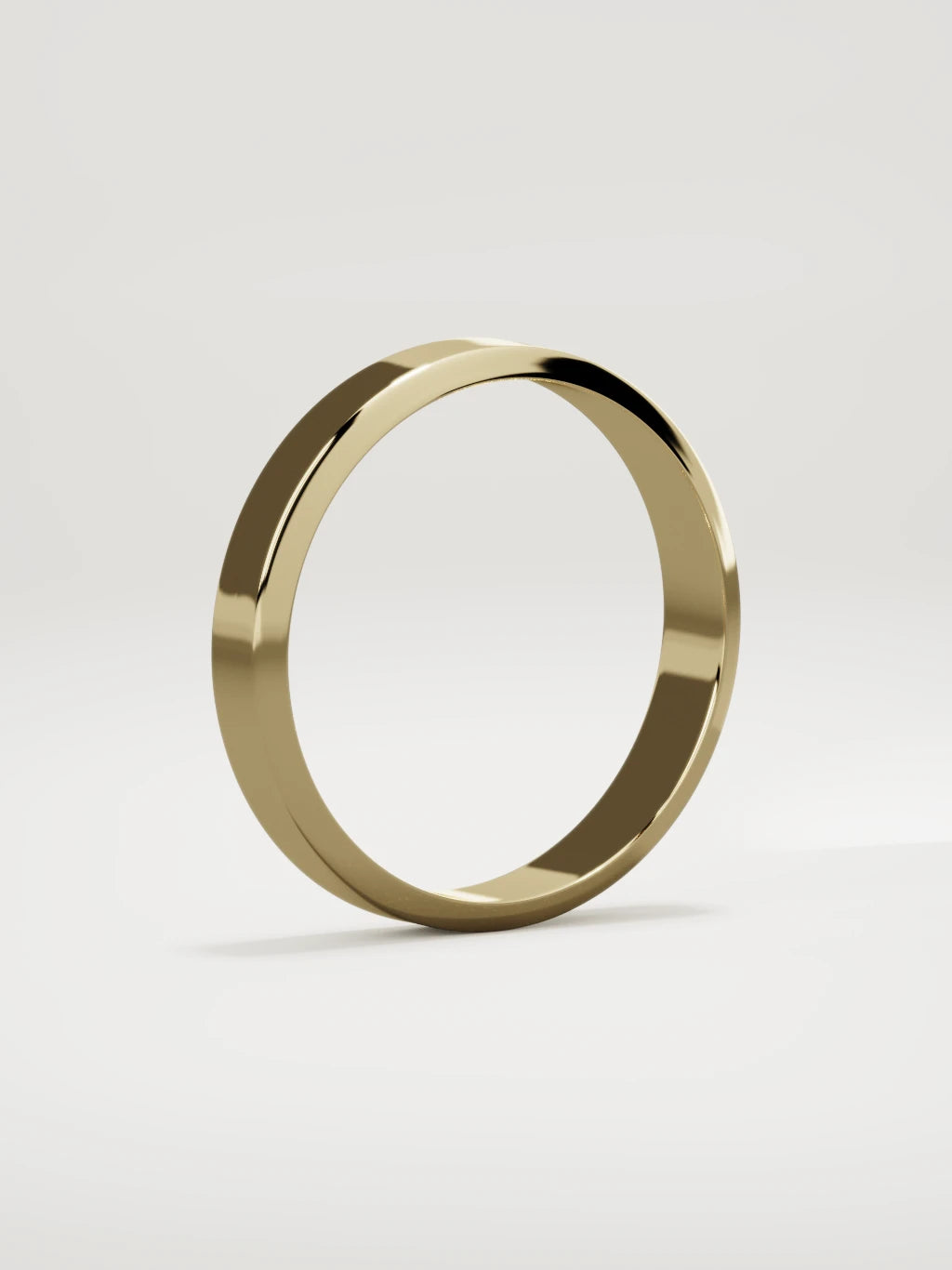 The Canto chamfered-edge men's wedding band in 14K yellow gold, 4 mm, standing three-quarter view