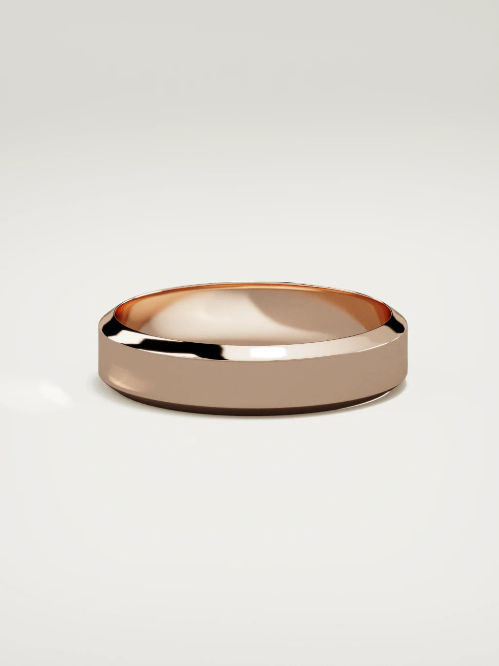 The Canto chamfered-edge men's wedding band in 14K rose gold, 5 mm, side view