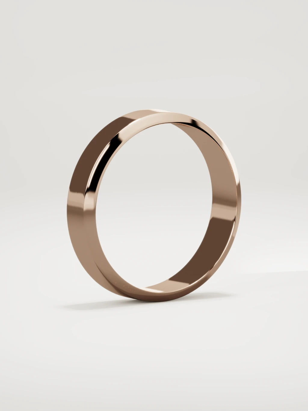 The Canto chamfered-edge men's wedding band in 14K rose gold, 5 mm, standing three-quarter view