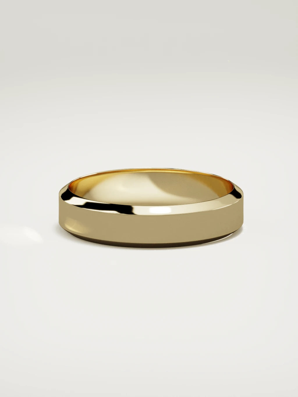 The Canto chamfered-edge men's wedding band in 14K yellow gold, 5 mm, side view