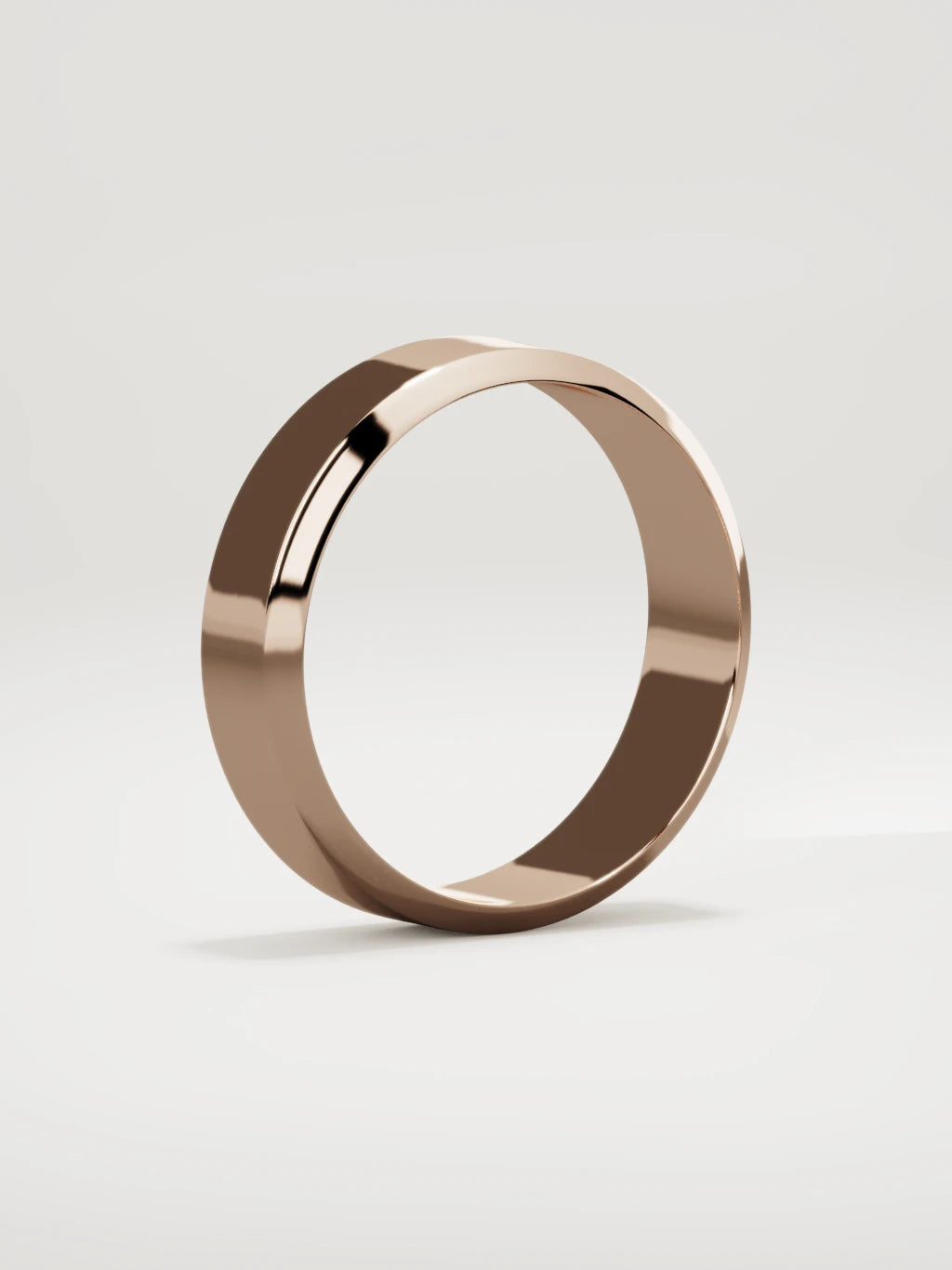 The Canto chamfered-edge men's wedding band in 14K rose gold, 6 mm, standing three-quarter view
