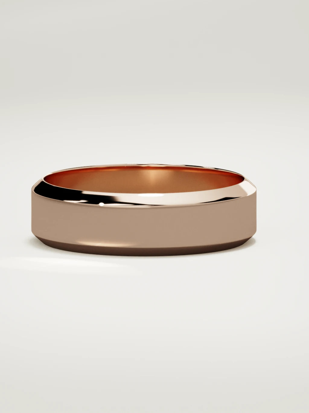The Canto chamfered-edge men's wedding band in 14K rose gold, 6 mm, three-quarter view