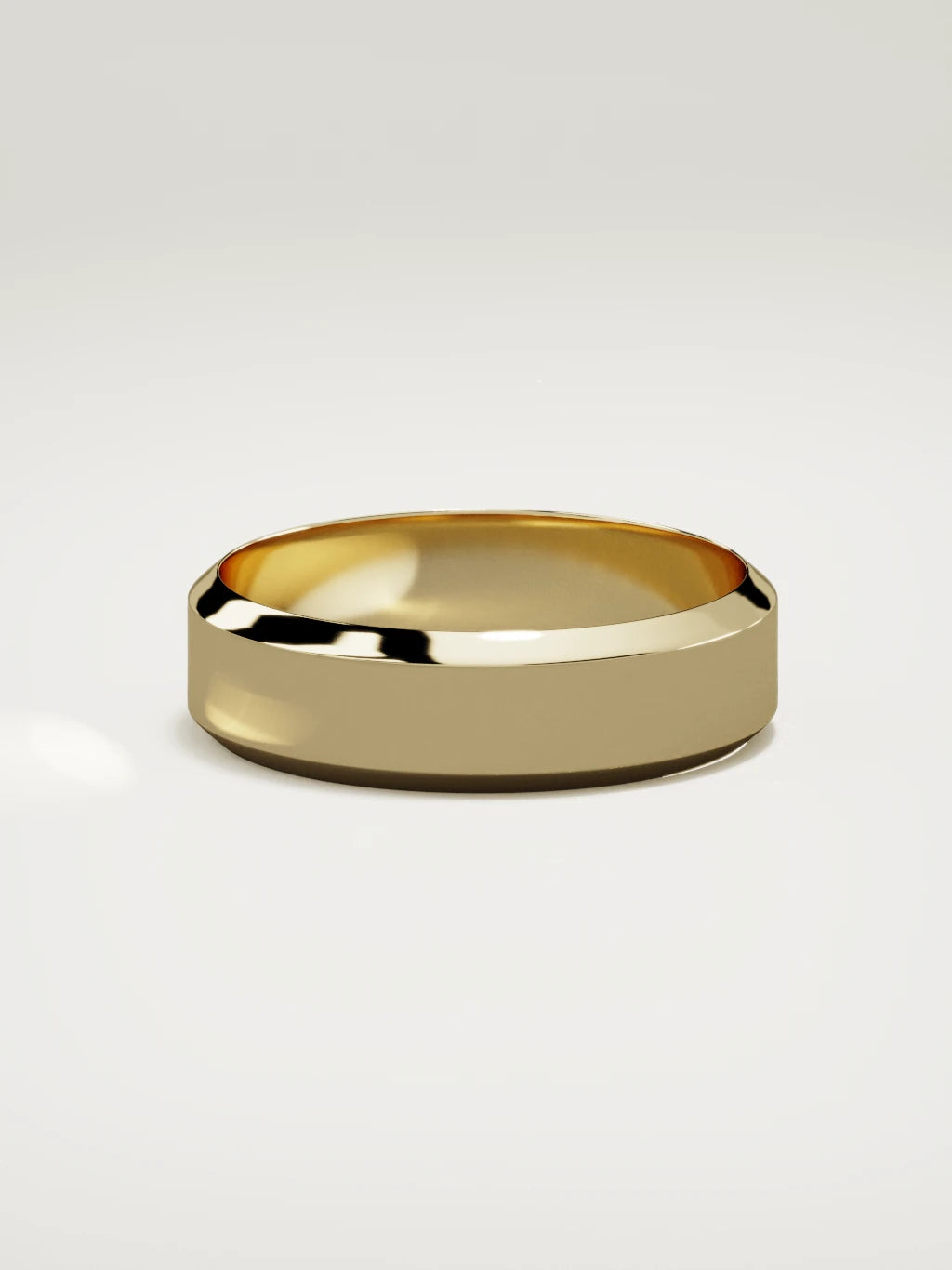 The Canto chamfered-edge men's wedding band in 14K yellow gold, 6 mm, side view