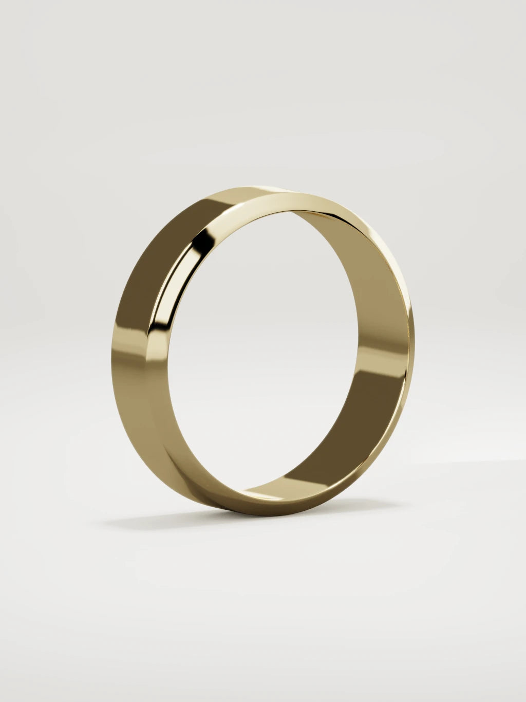 The Canto chamfered-edge men's wedding band in 14K yellow gold, 6 mm, standing three-quarter view
