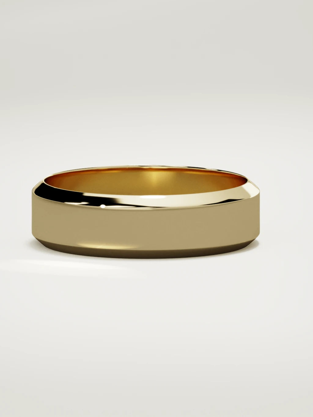 The Canto chamfered-edge men's wedding band in 14K yellow gold, 6 mm, three-quarter view