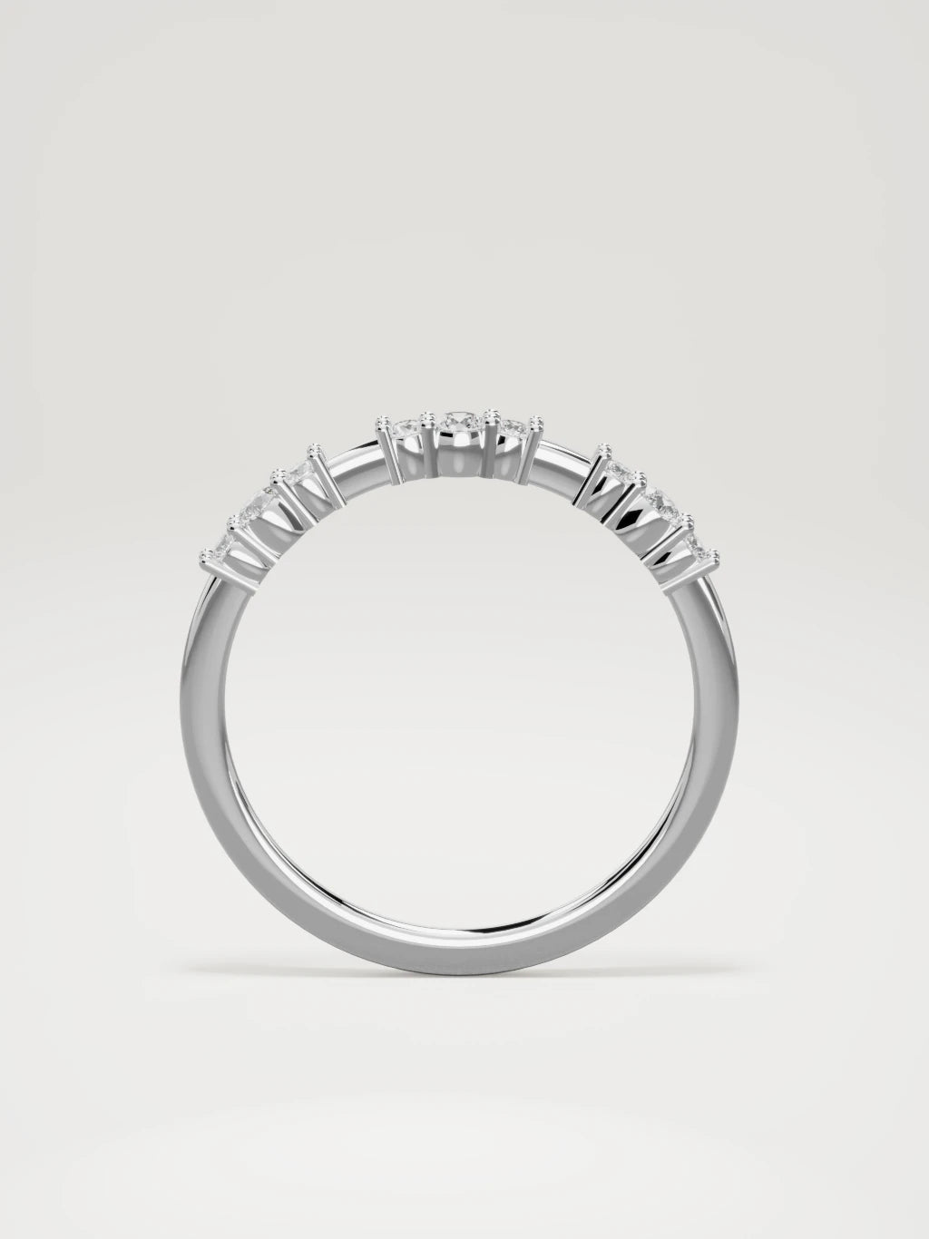 The Cielo scattered diamond band in 14K white gold, standing front view