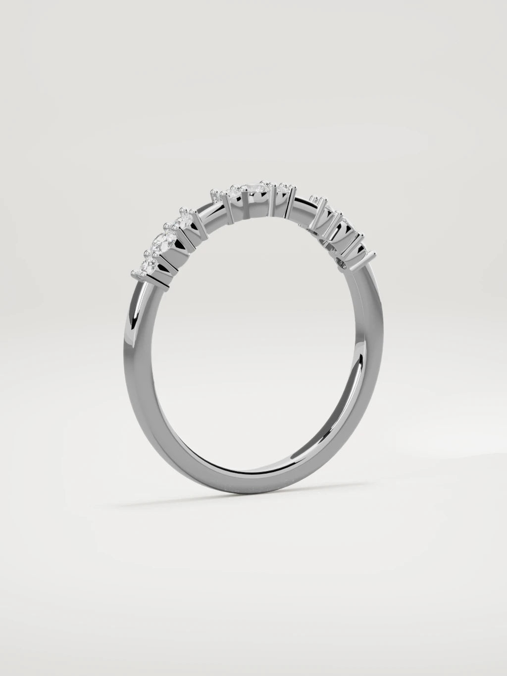 The Cielo scattered diamond band in 14K white gold, standing three-quarter view