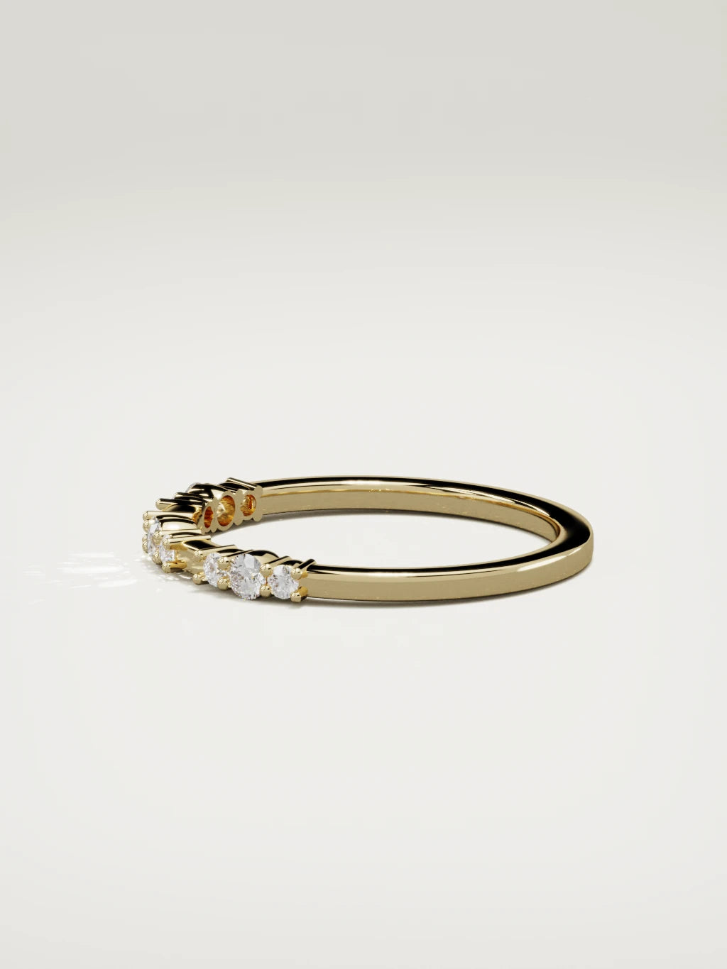 The Cielo scattered diamond band in 14K yellow gold, side view
