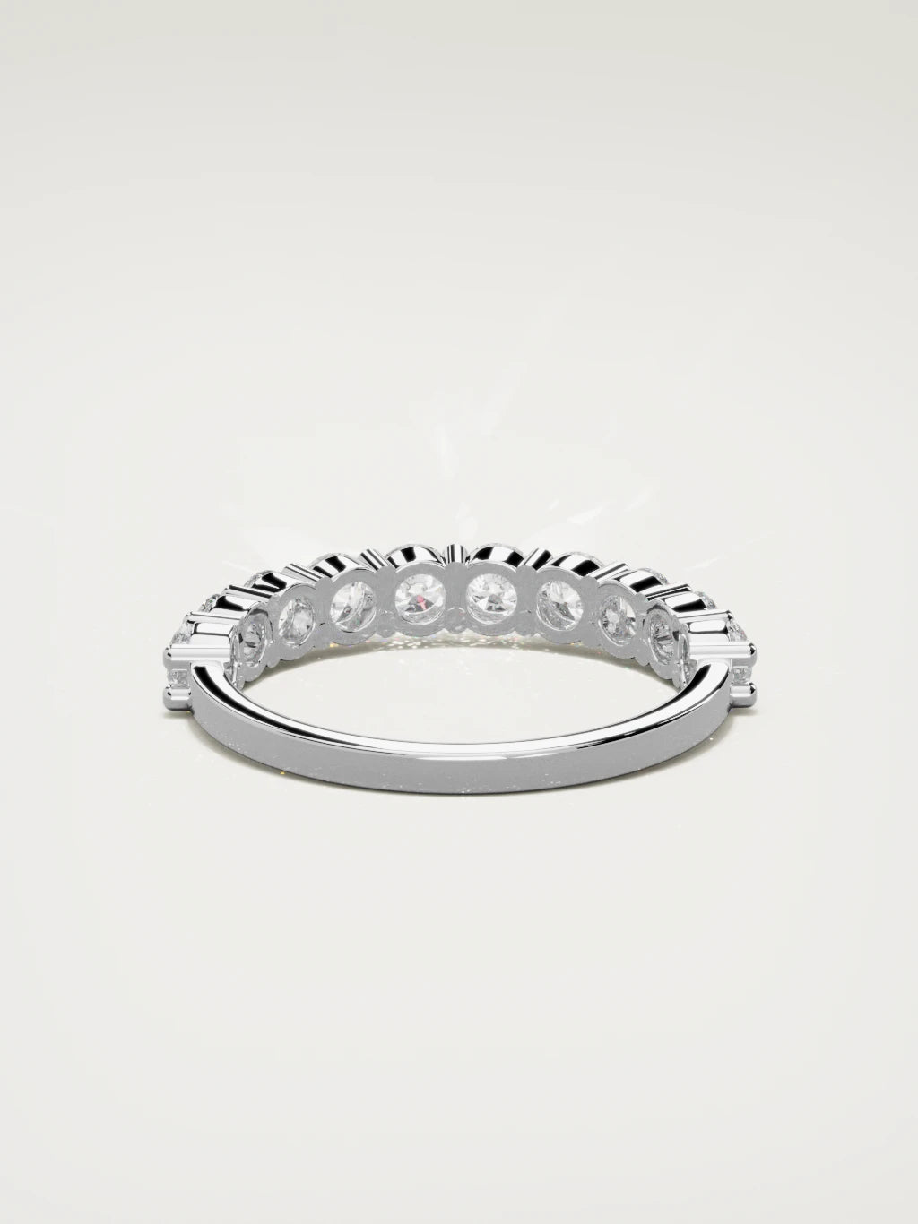 The Clara shared-prong half eternity band in 14K white gold, back view