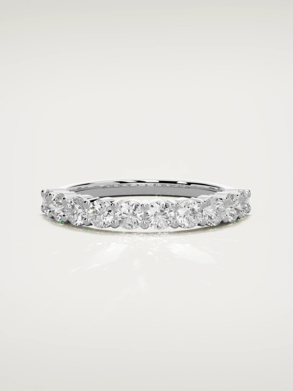 The Clara shared-prong half eternity band in 14K white gold, front view
