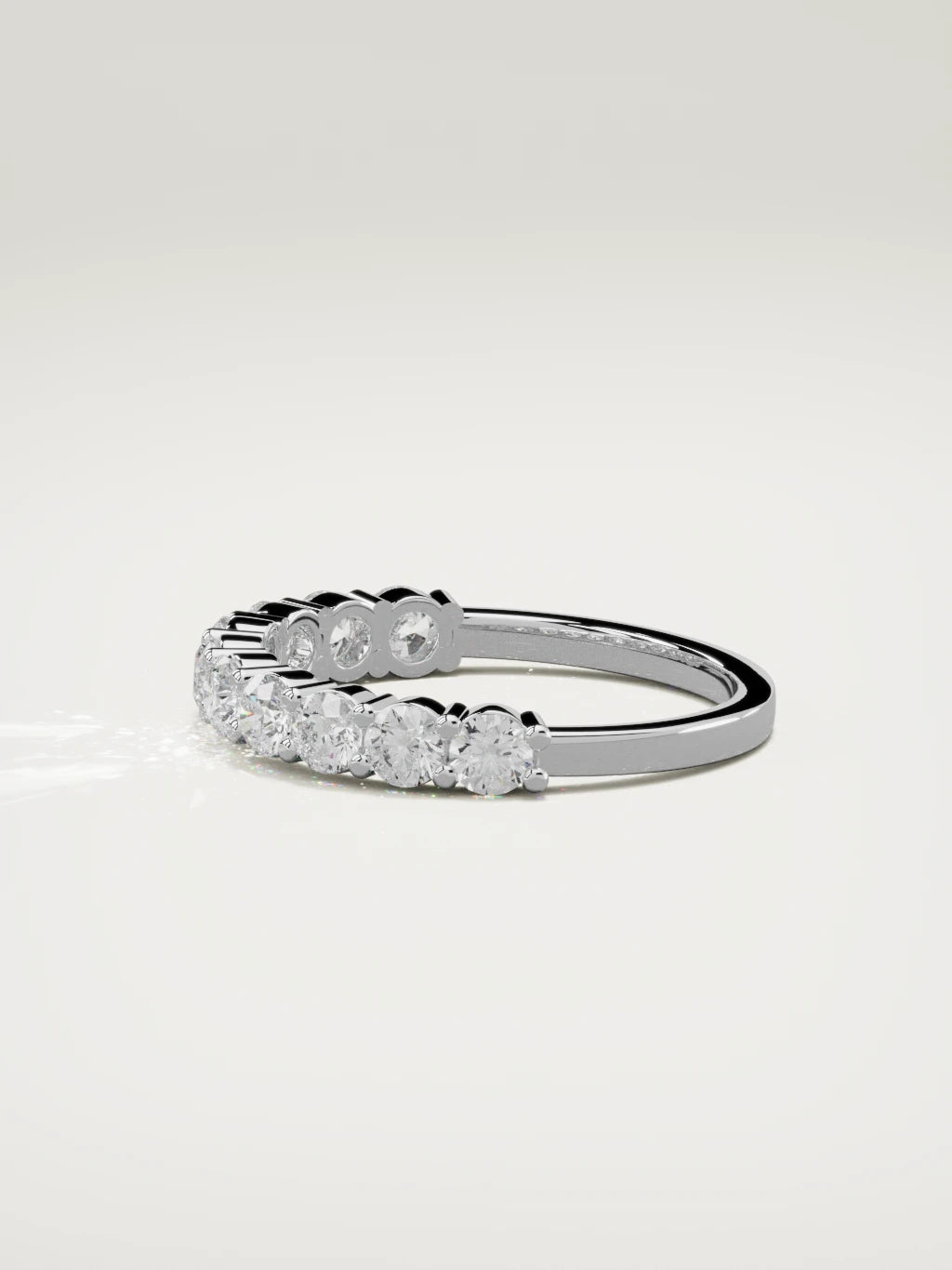 The Clara shared-prong half eternity band in 14K white gold, side view