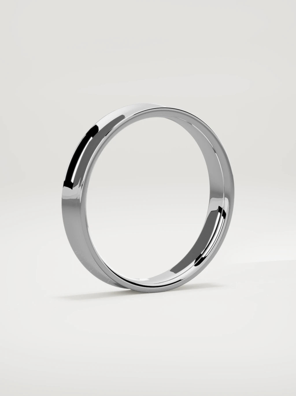 The Calma comfort-fit flat men's wedding band in 14K white gold, 4 mm, standing three-quarter view