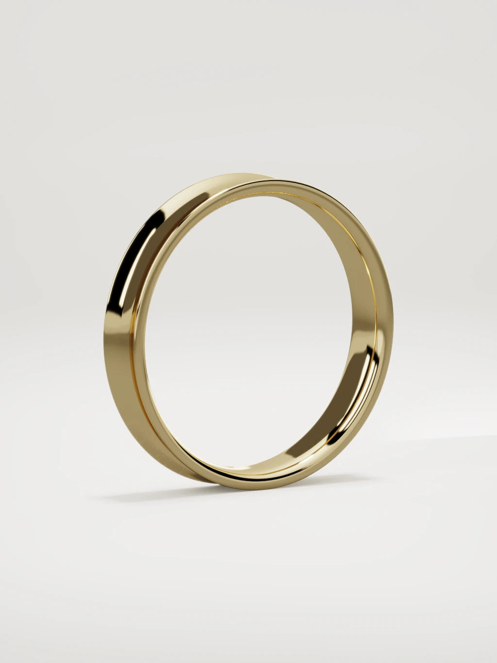 The Calma comfort-fit flat men's wedding band in 14K yellow gold, 4 mm, standing three-quarter view