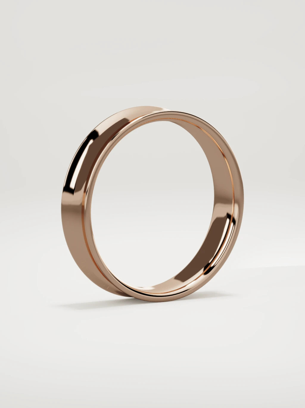 The Calma comfort-fit flat men's wedding band in 14K rose gold, 5 mm, standing three-quarter view
