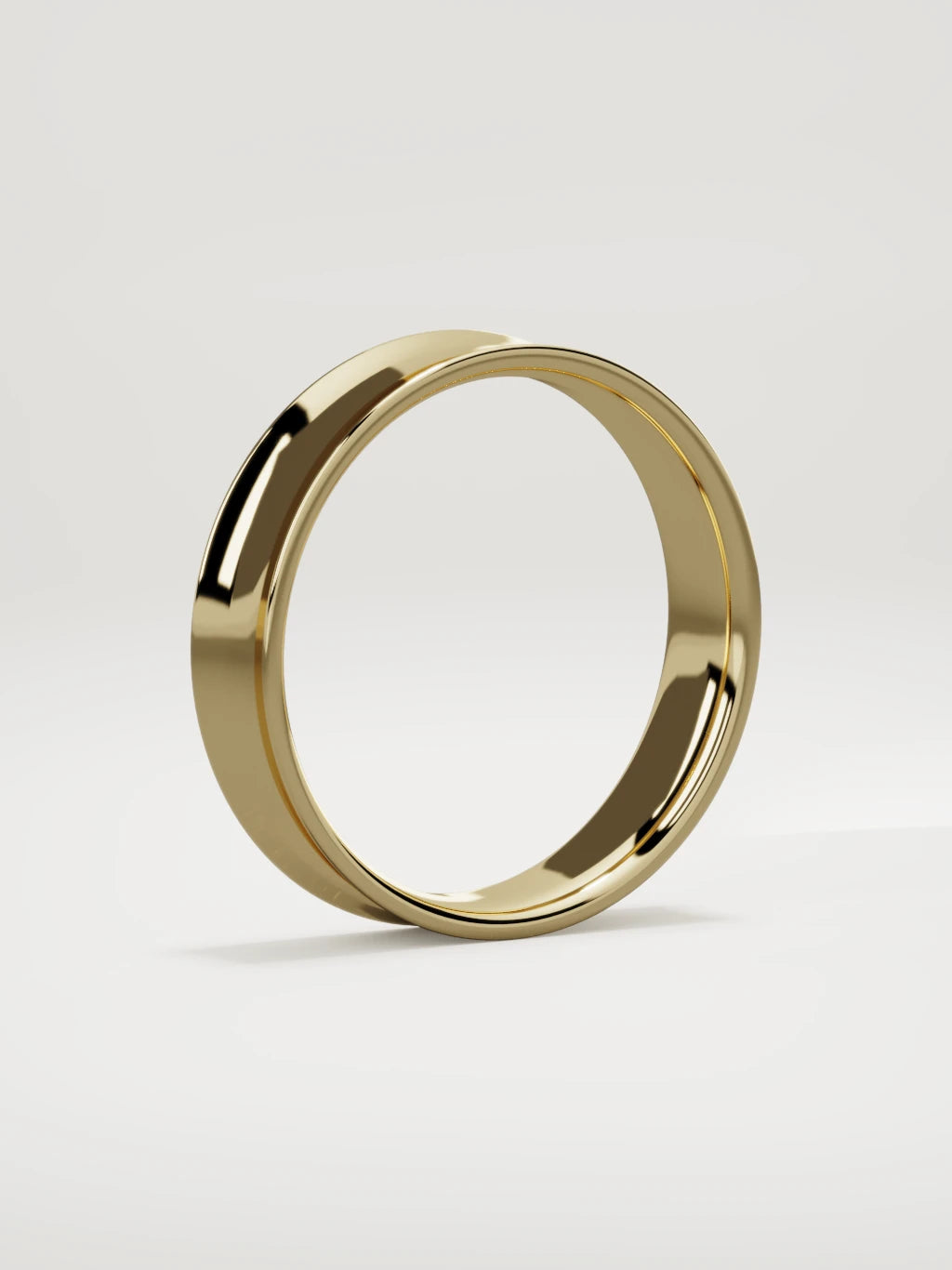 The Calma comfort-fit flat men's wedding band in 14K yellow gold, 5 mm, standing three-quarter view
