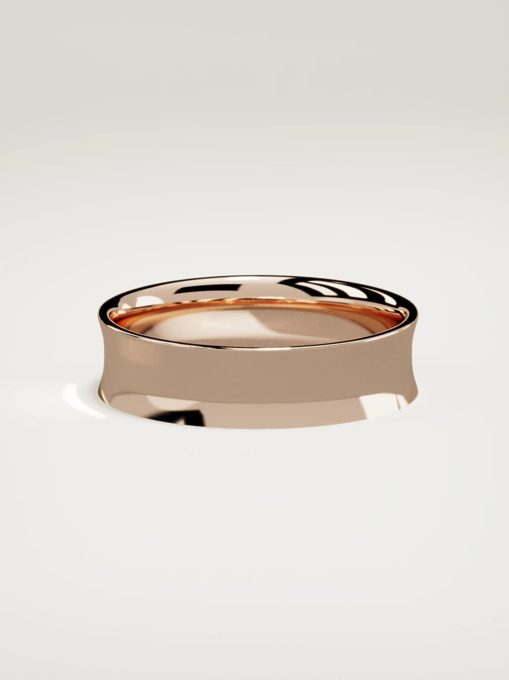 The Calma comfort-fit flat men's wedding band in 14K rose gold, 6 mm, side view