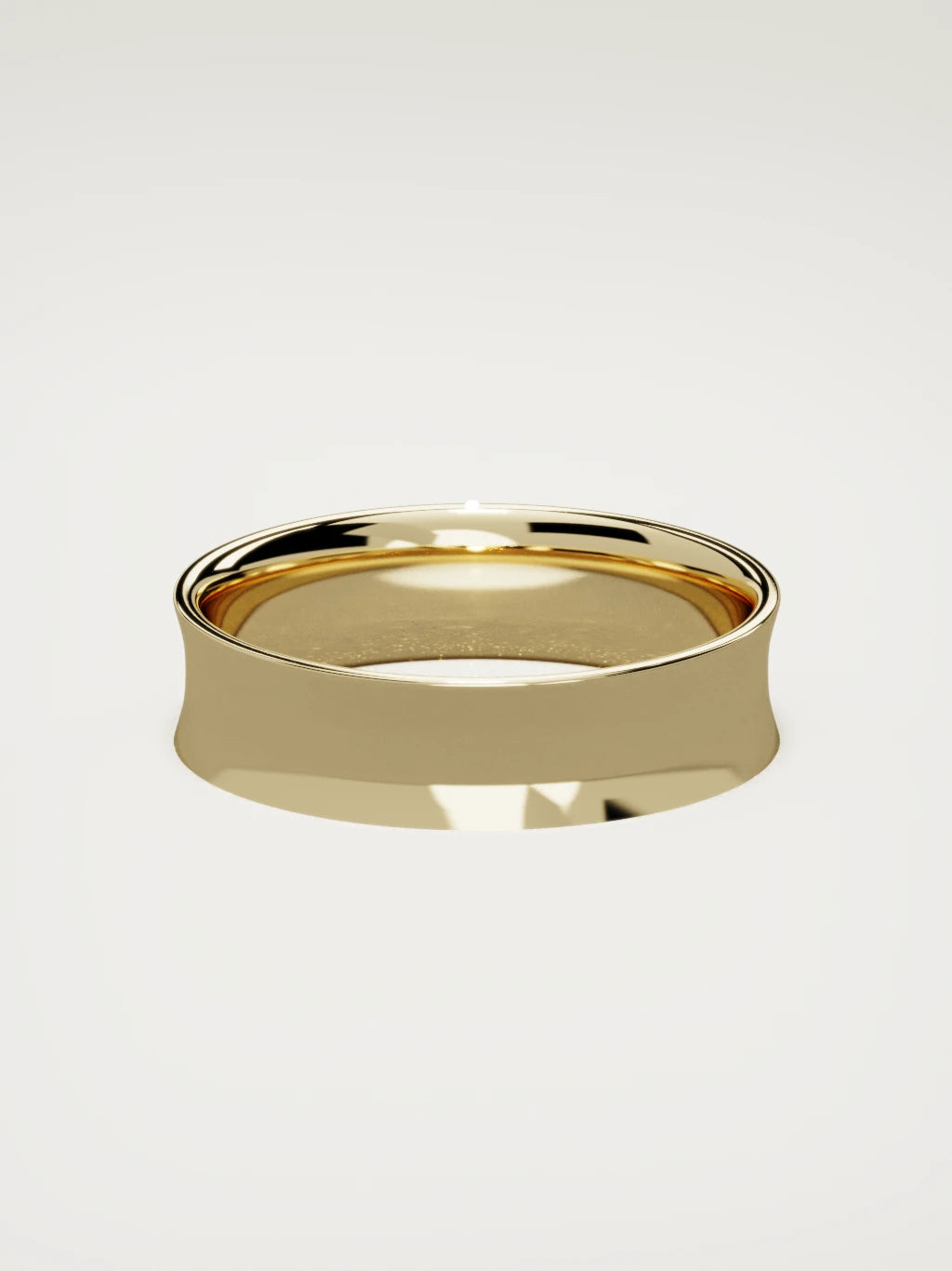 The Calma comfort-fit flat men's wedding band in 14K yellow gold, 6 mm, back view
