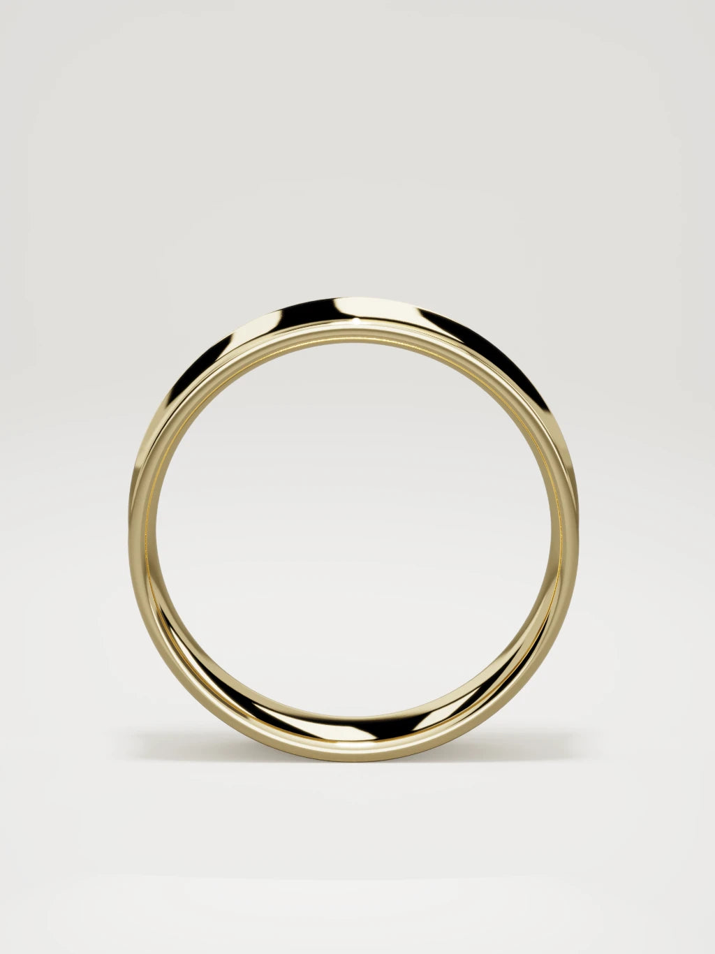 The Calma comfort-fit flat men's wedding band in 14K yellow gold, 6 mm, standing front view