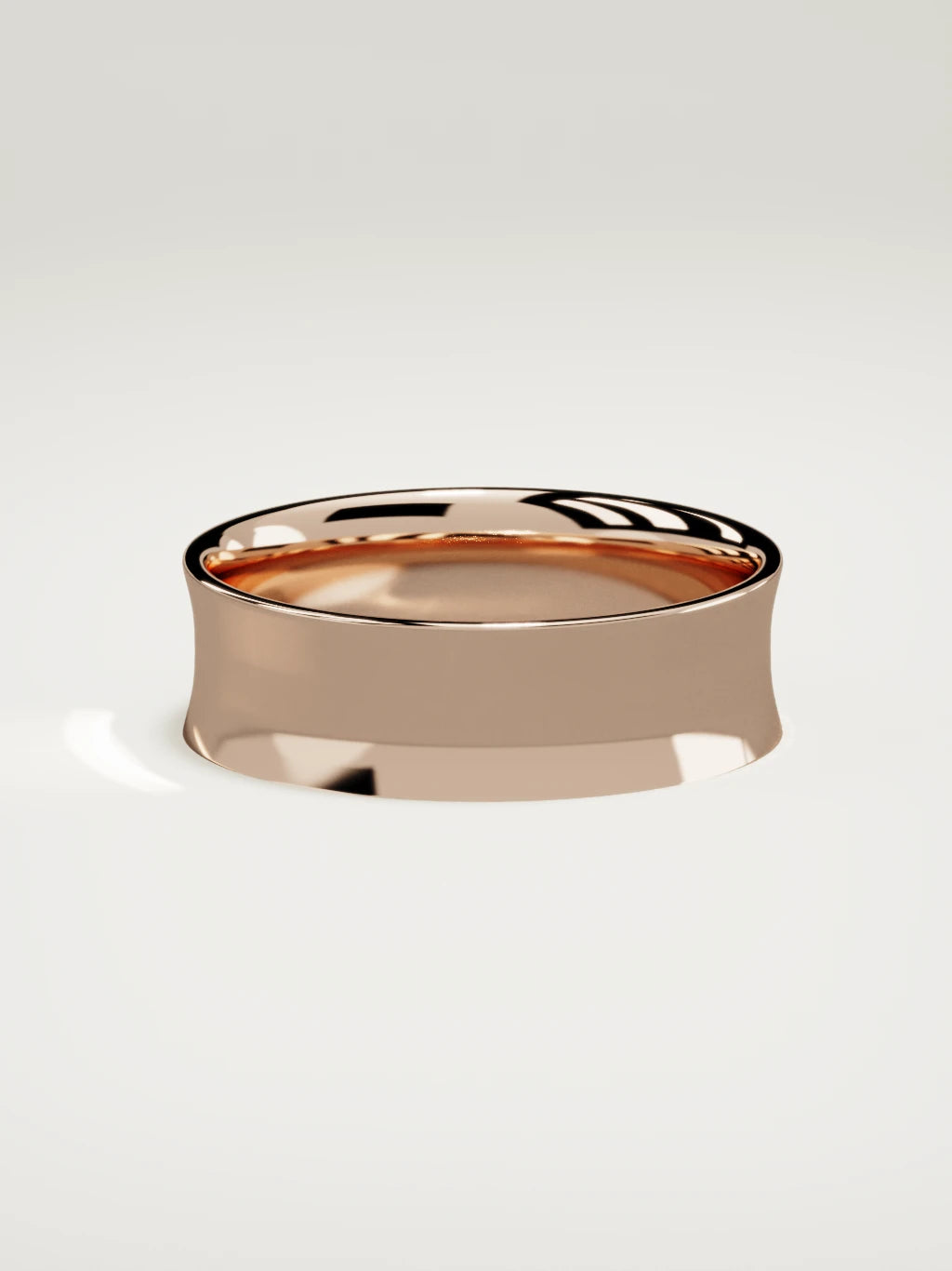 The Calma comfort-fit flat men's wedding band in 14K rose gold, 7 mm, side view