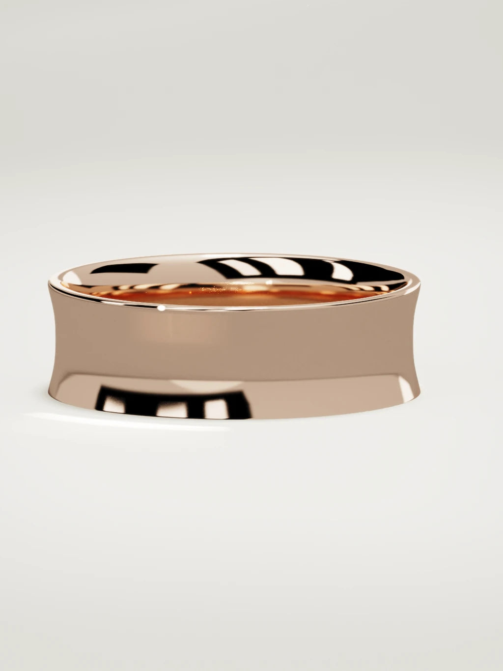 The Calma comfort-fit flat men's wedding band in 14K rose gold, 7 mm, three-quarter view