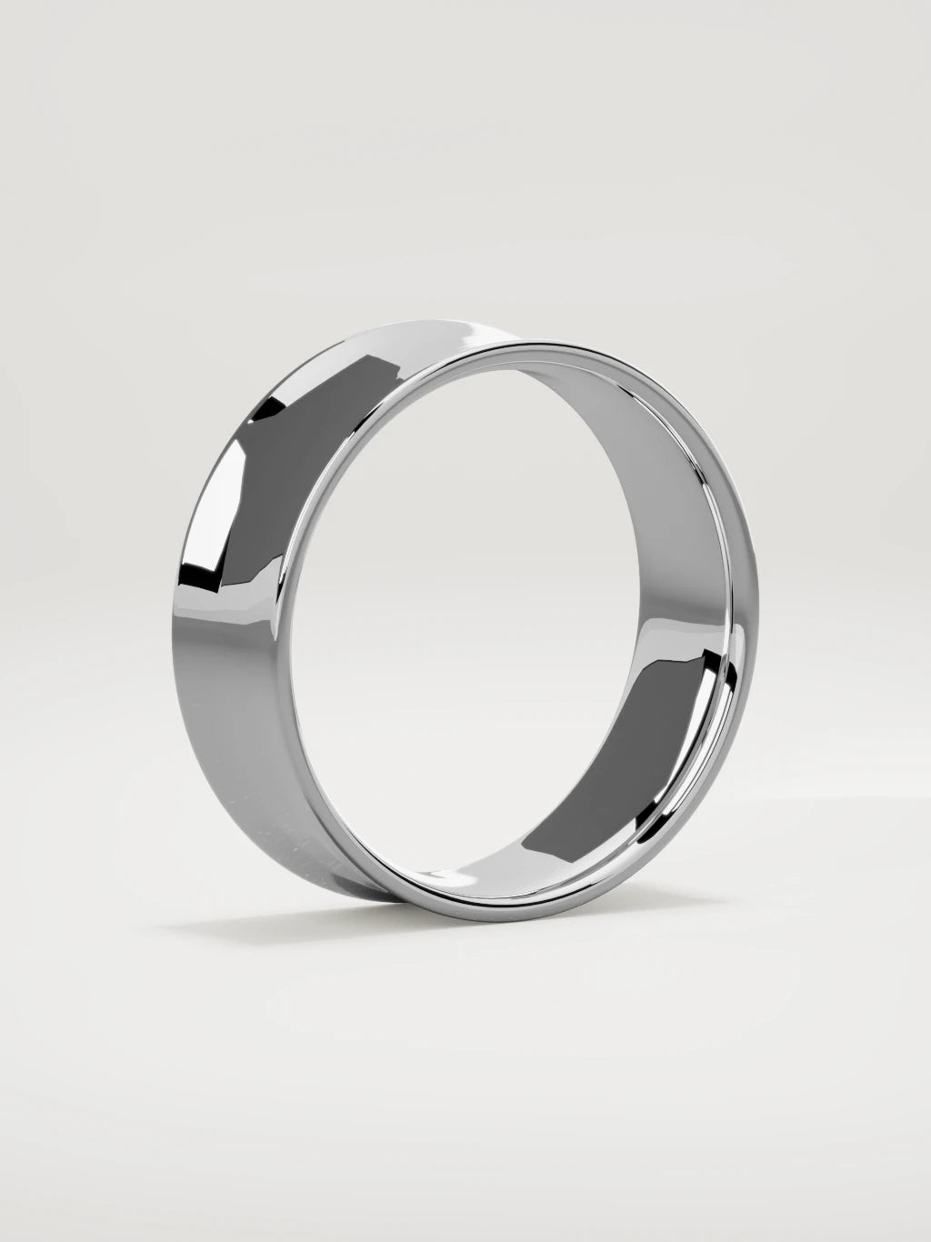 The Calma comfort-fit flat men's wedding band in 14K white gold, 7 mm, standing three-quarter view