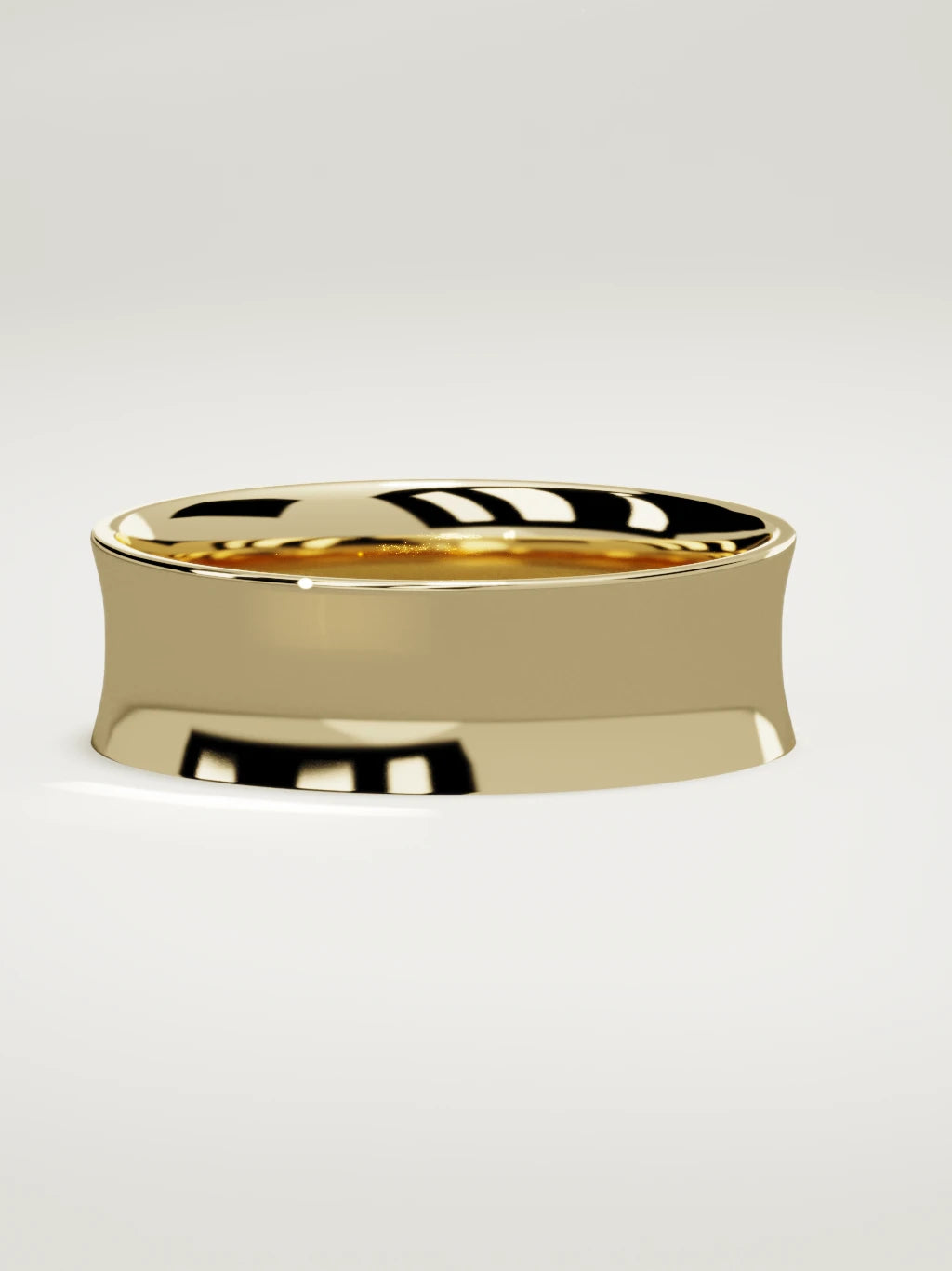 The Calma comfort-fit flat men's wedding band in 14K yellow gold, 7 mm, three-quarter view
