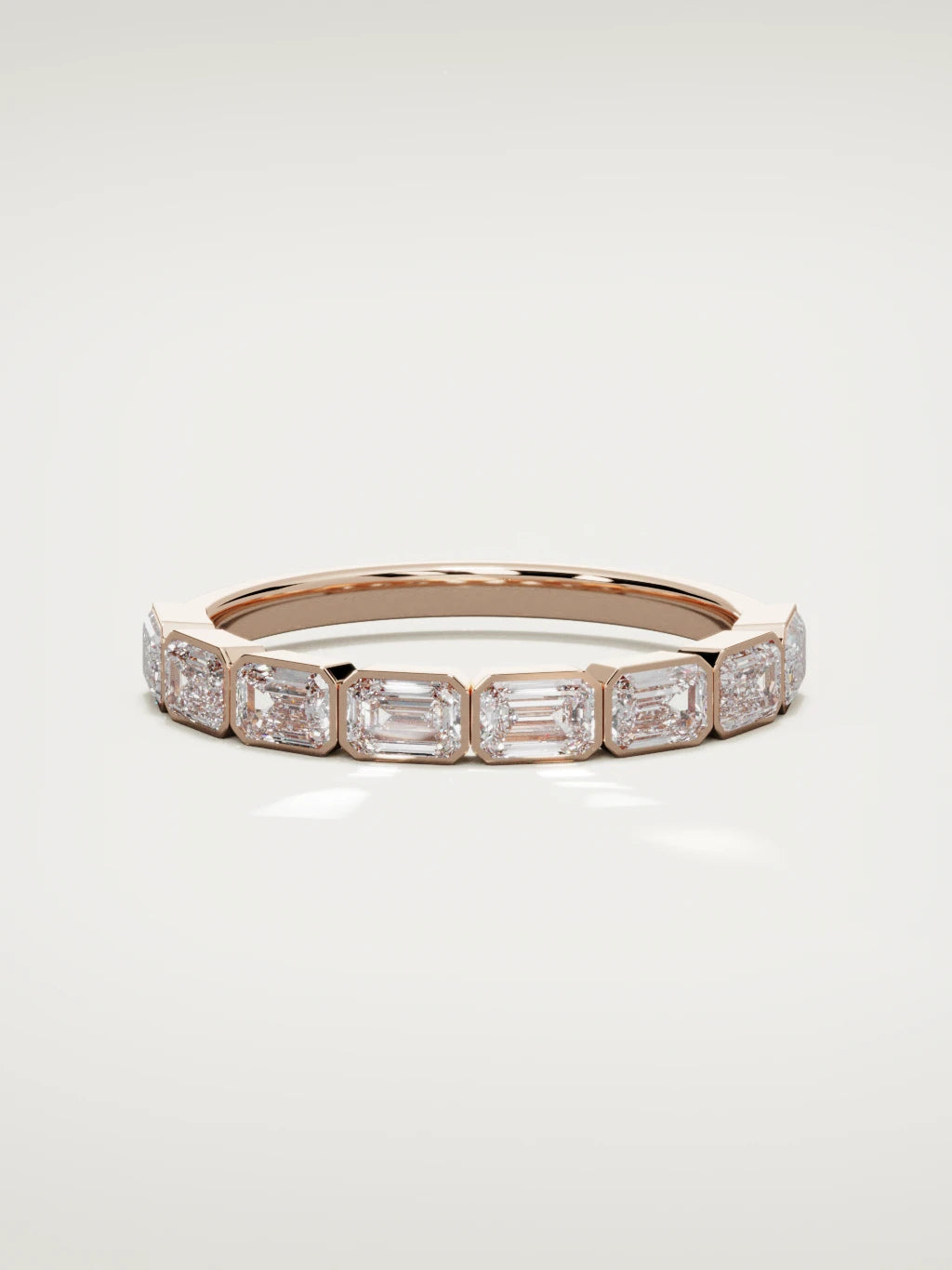 The Cristal east-west bezel emerald-cut band in 14K rose gold, front view