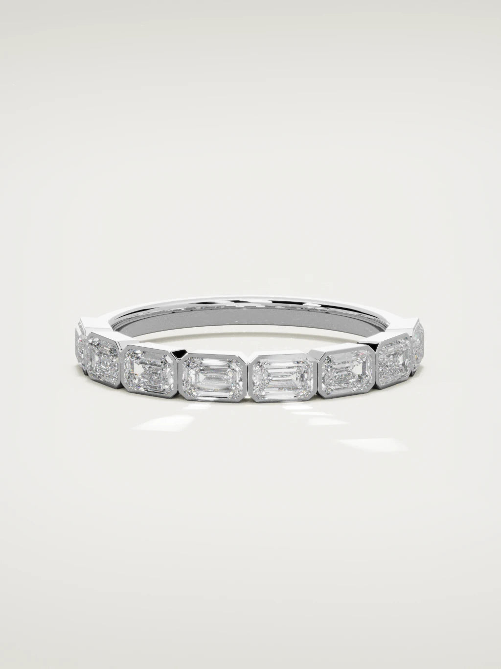 The Cristal east-west bezel emerald-cut band in 14K white gold, front view