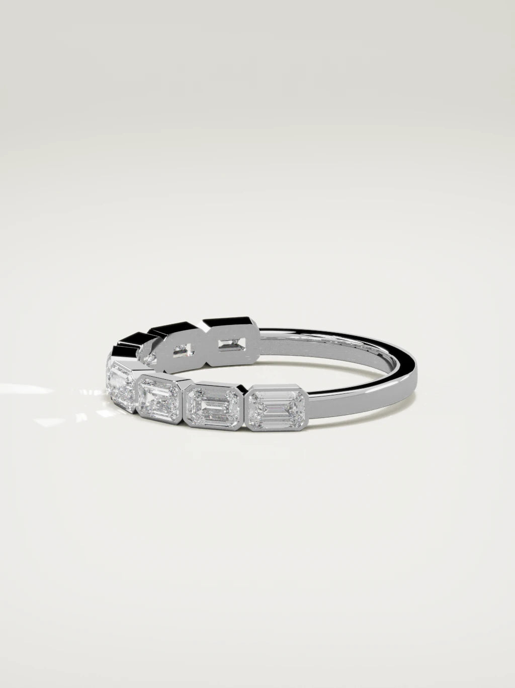 The Cristal east-west bezel emerald-cut band in 14K white gold, side view
