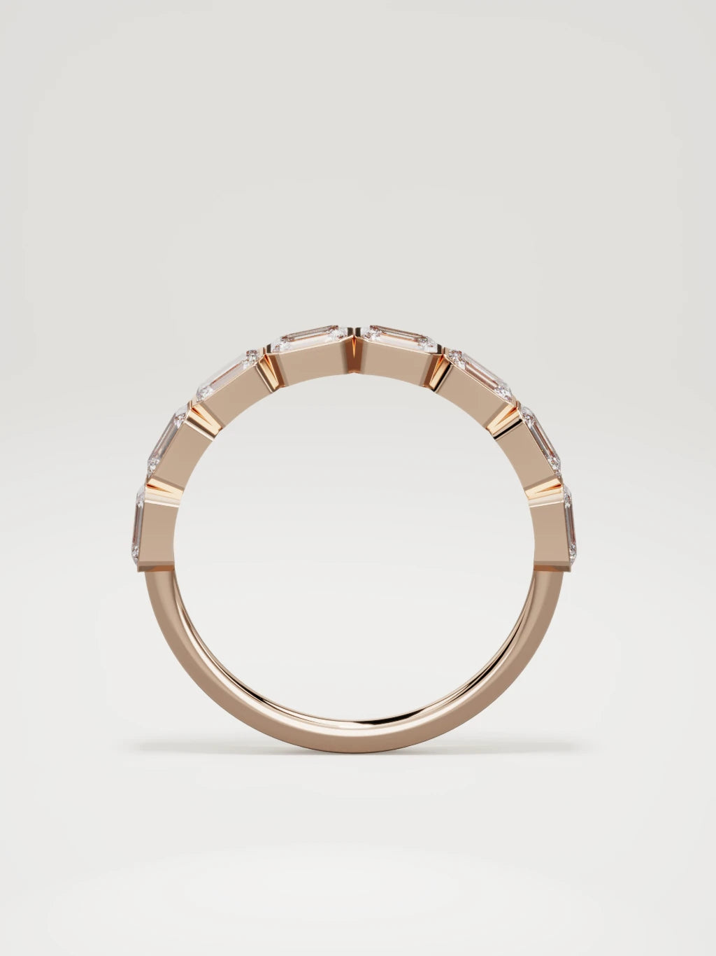 The Cristal east-west bezel emerald-cut band in 14K rose gold, standing front view