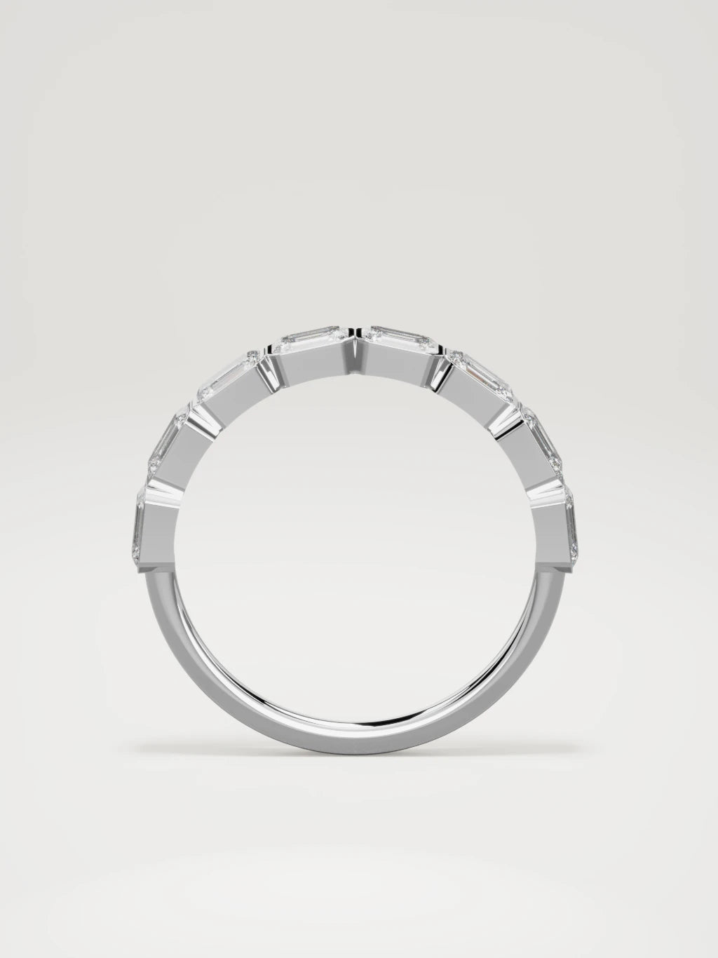 The Cristal east-west bezel emerald-cut band in 14K white gold, standing front view