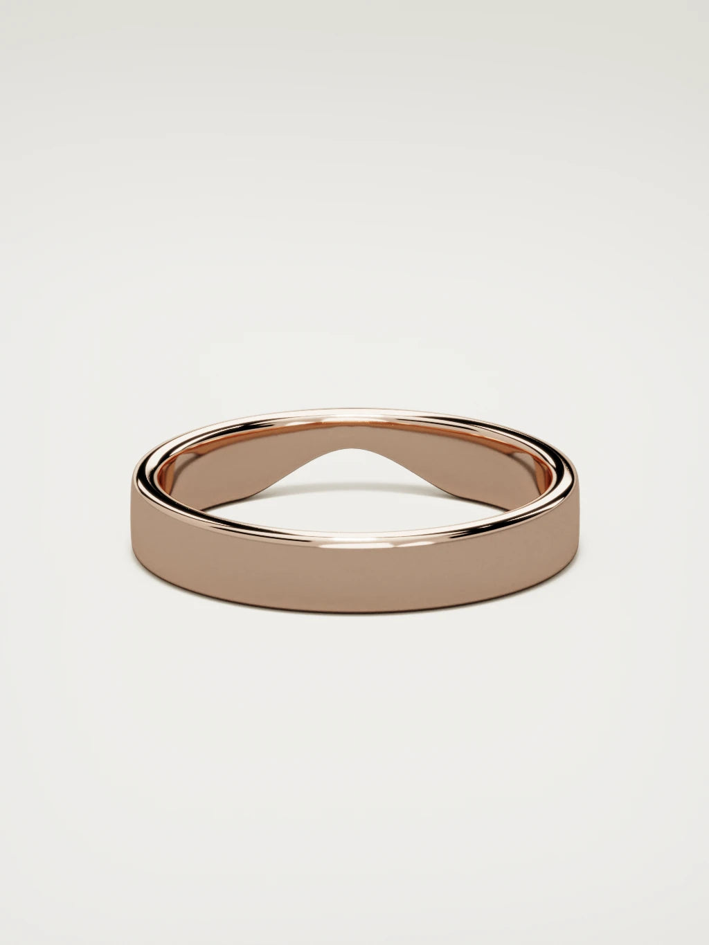 The Cuna wide notched contour wedding band in 14K rose gold, back view