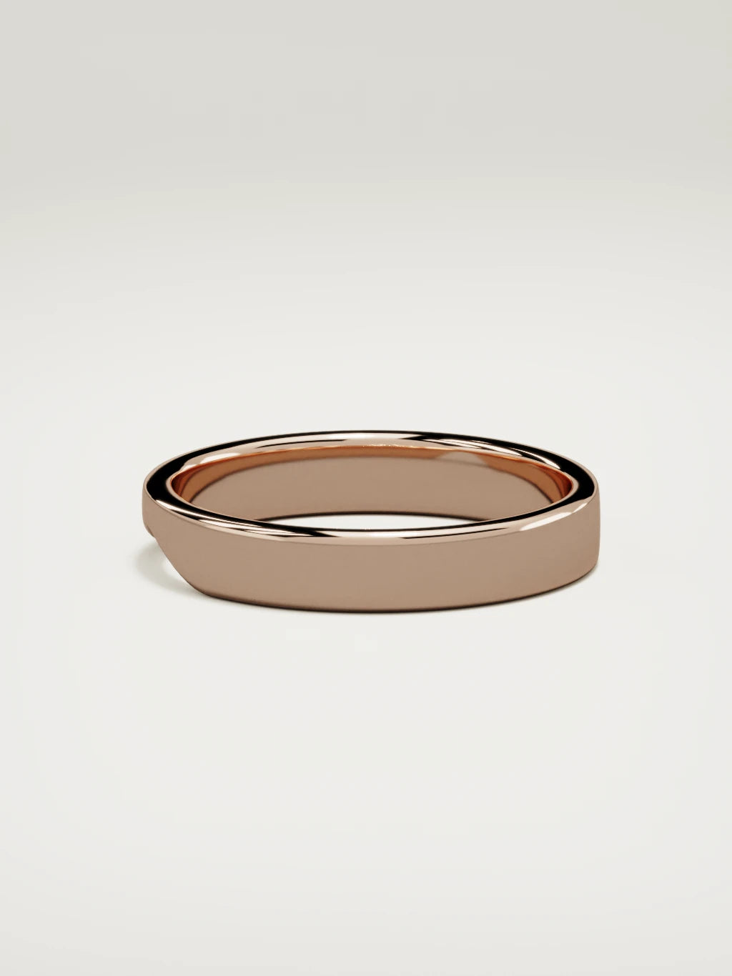The Cuna wide notched contour wedding band in 14K rose gold, side view