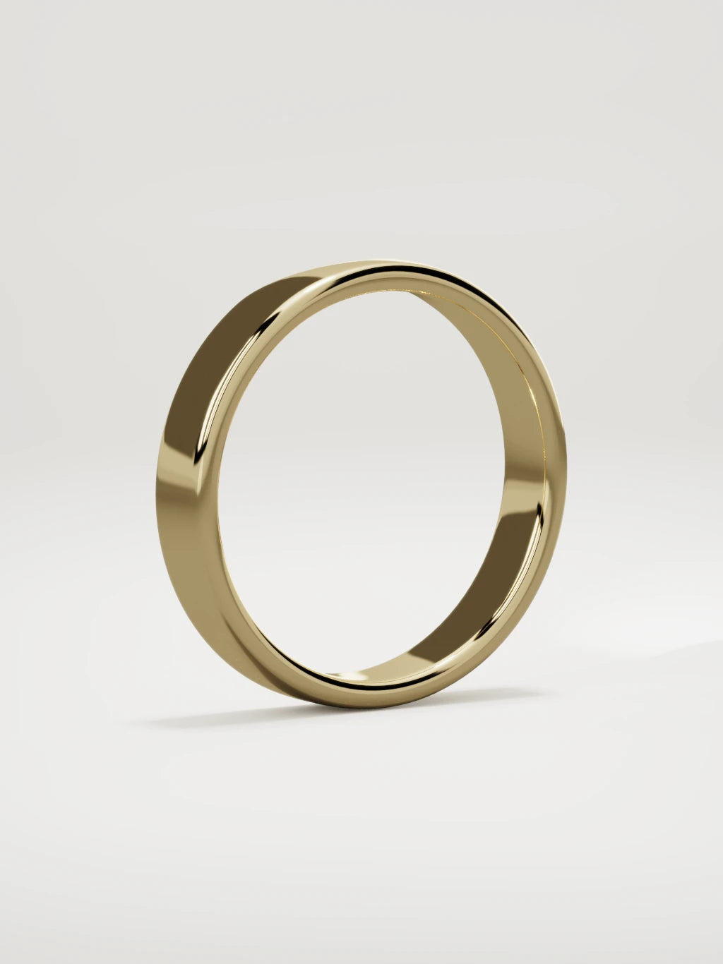The Cuna wide notched contour wedding band in 14K yellow gold, standing three-quarter view