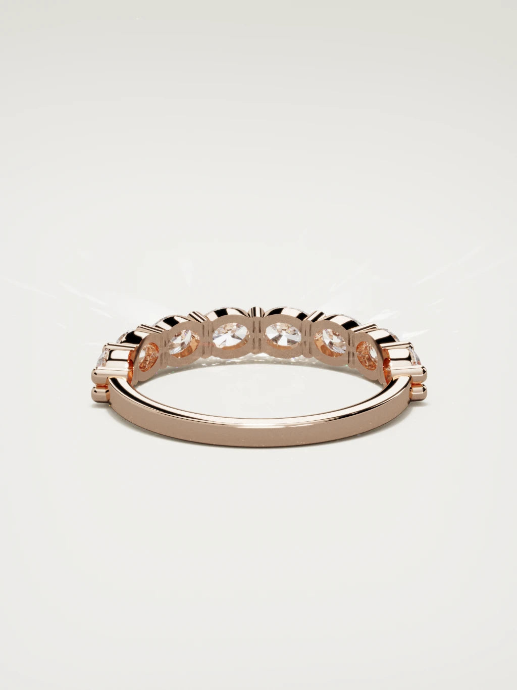 The Dama east-west oval half eternity band in 14K rose gold, back view