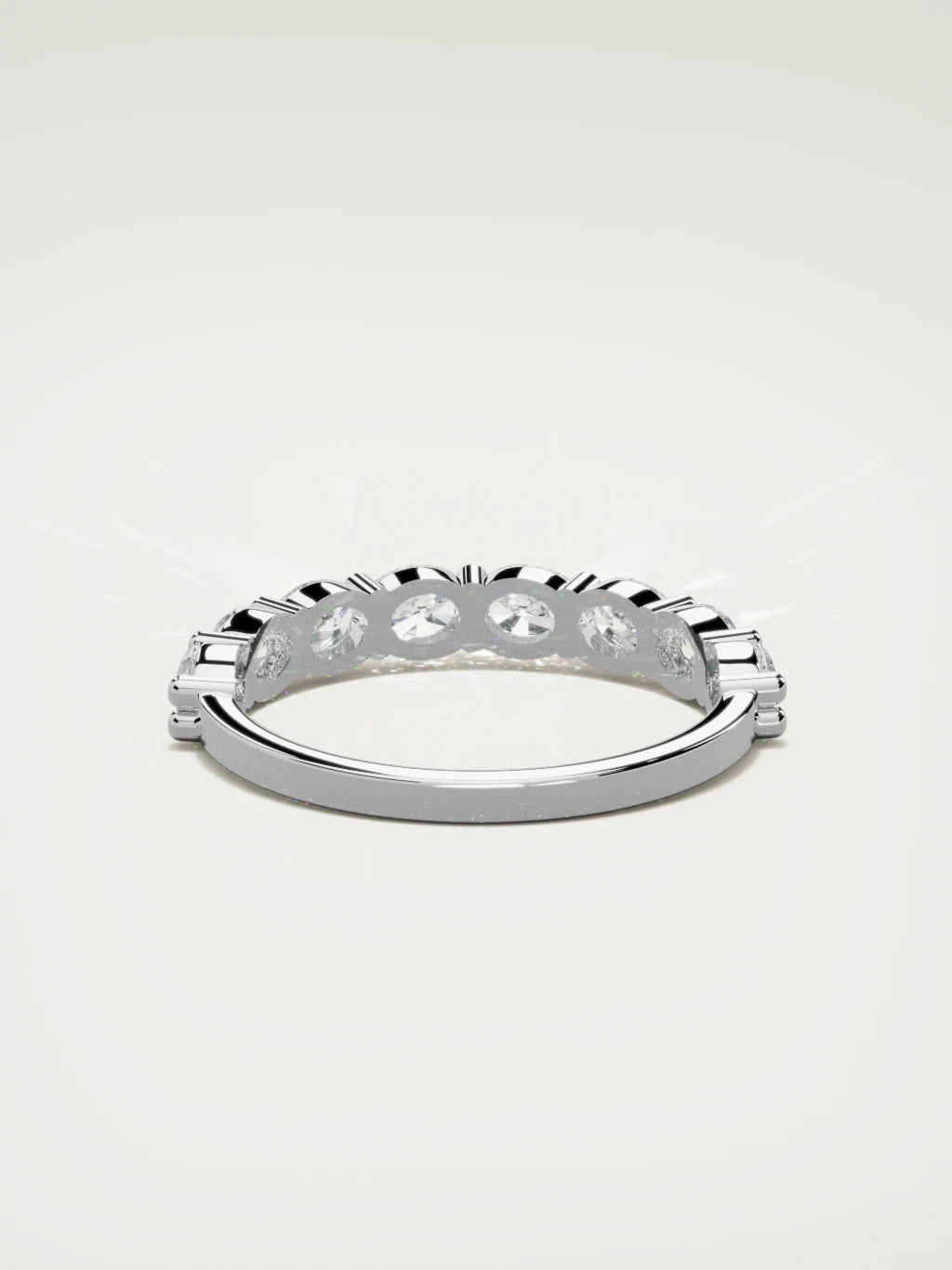 The Dama east-west oval half eternity band in 14K white gold, back view