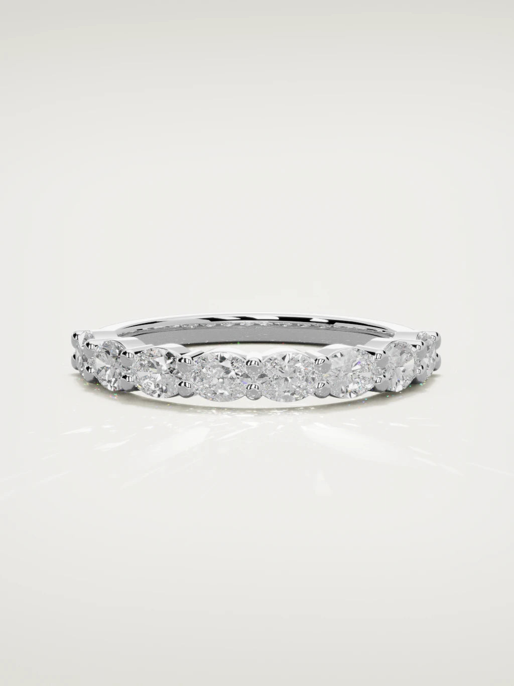 The Dama east-west oval half eternity band in 14K white gold, front view