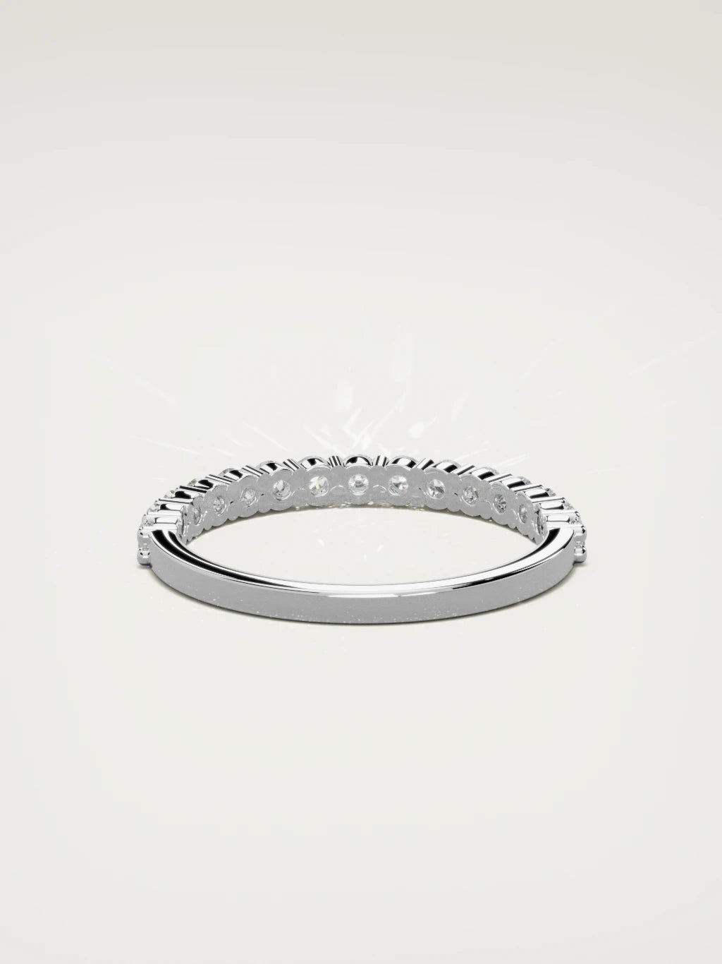 The Danza petite shared-prong half eternity band in 14K white gold, back view