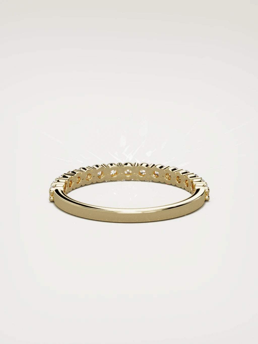The Danza petite shared-prong half eternity band in 14K yellow gold, back view