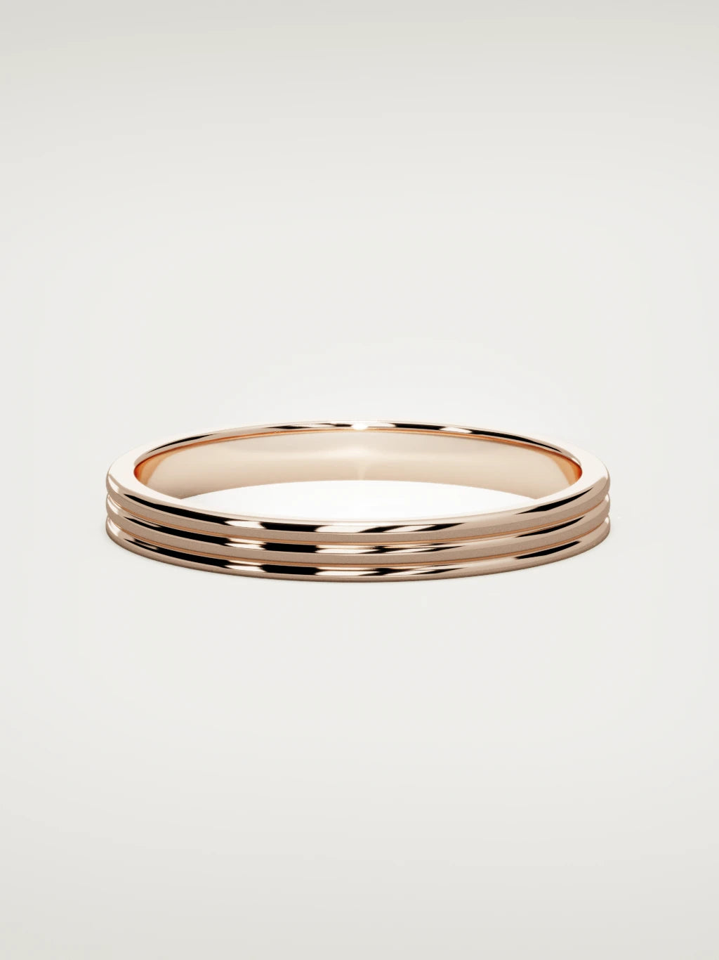 The Doble double-groove men's wedding band in 14K rose gold, 3 mm, front view