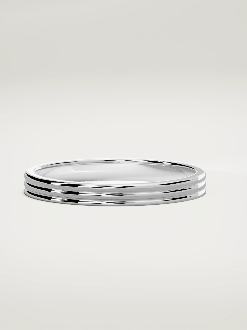 The Doble double-groove men's wedding band in 14K white gold, 3 mm, three-quarter view