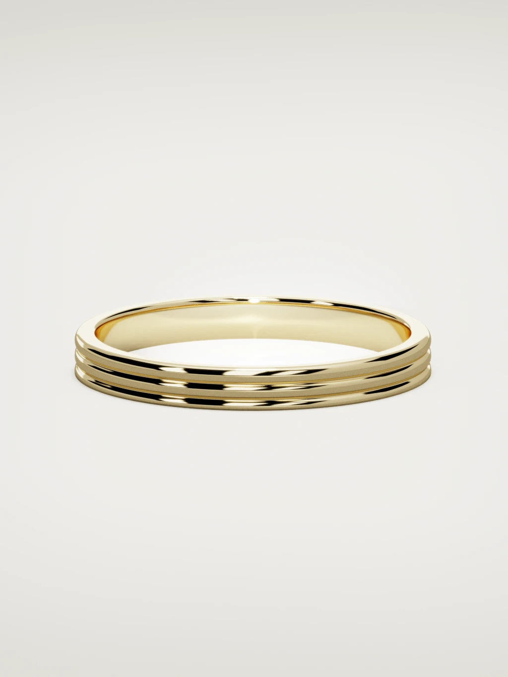 The Doble double-groove men's wedding band in 14K yellow gold, 3 mm, front view