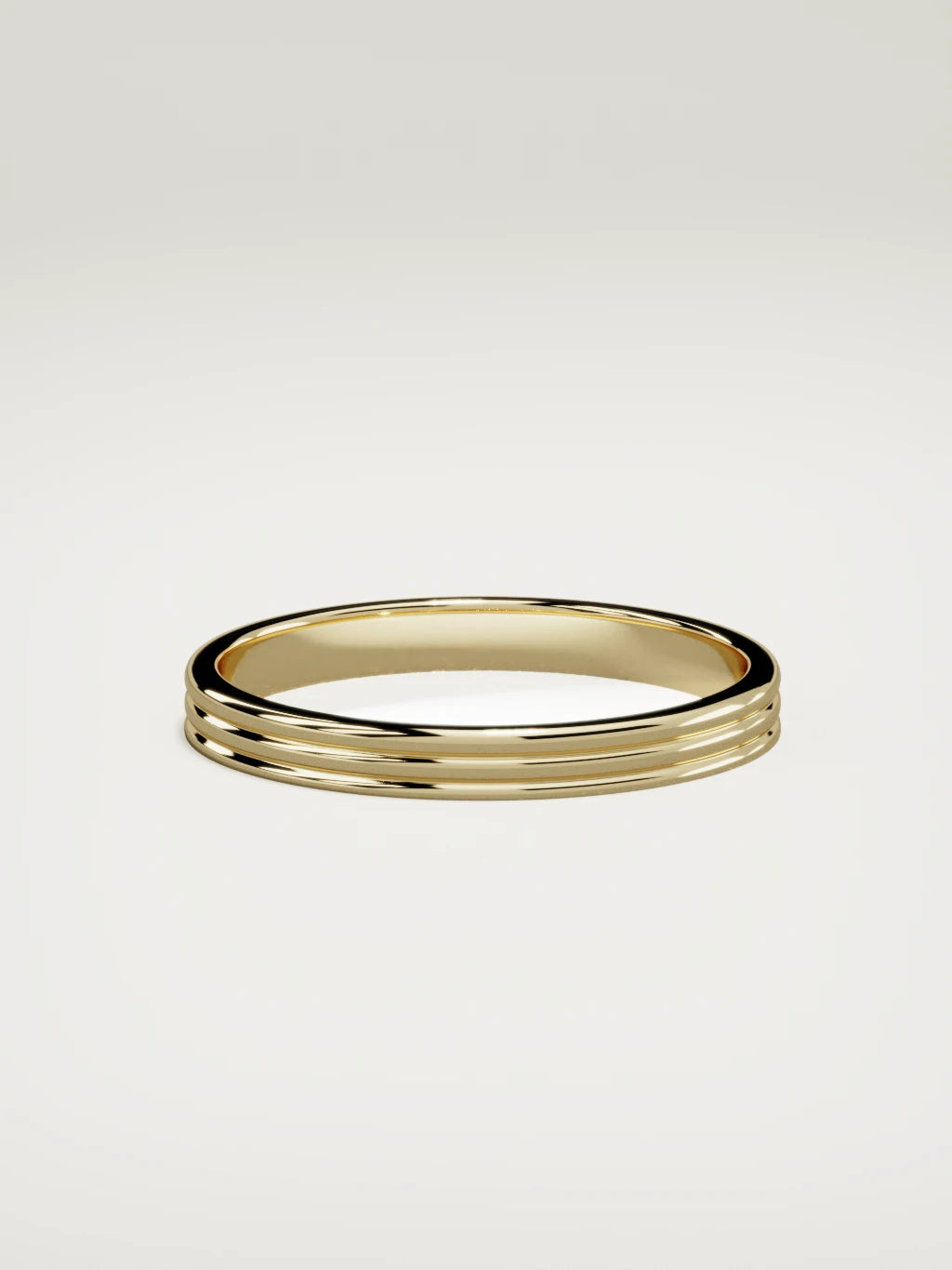 The Doble double-groove men's wedding band in 14K yellow gold, 3 mm, side view