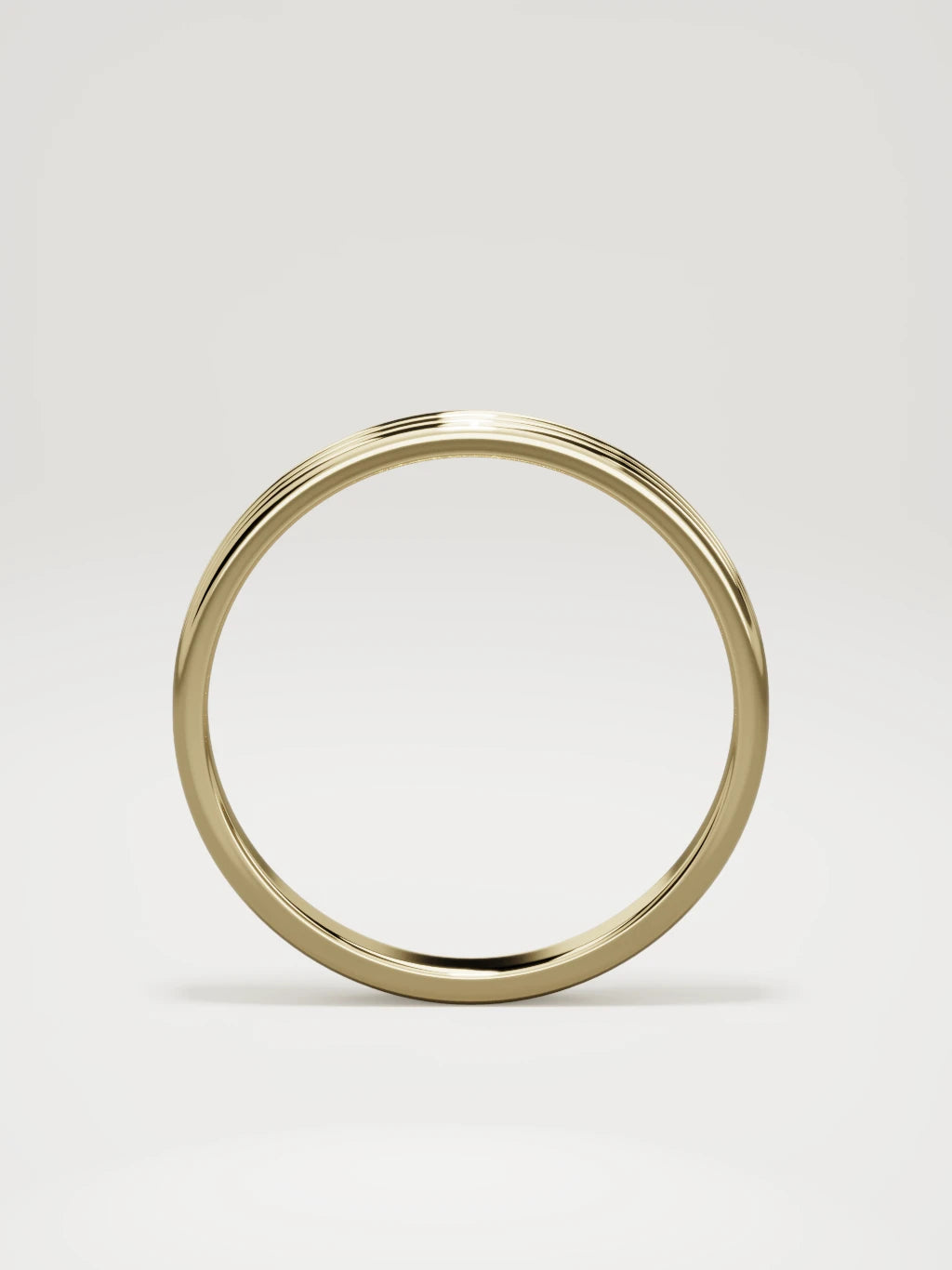 The Doble double-groove men's wedding band in 14K yellow gold, 3 mm, standing front view